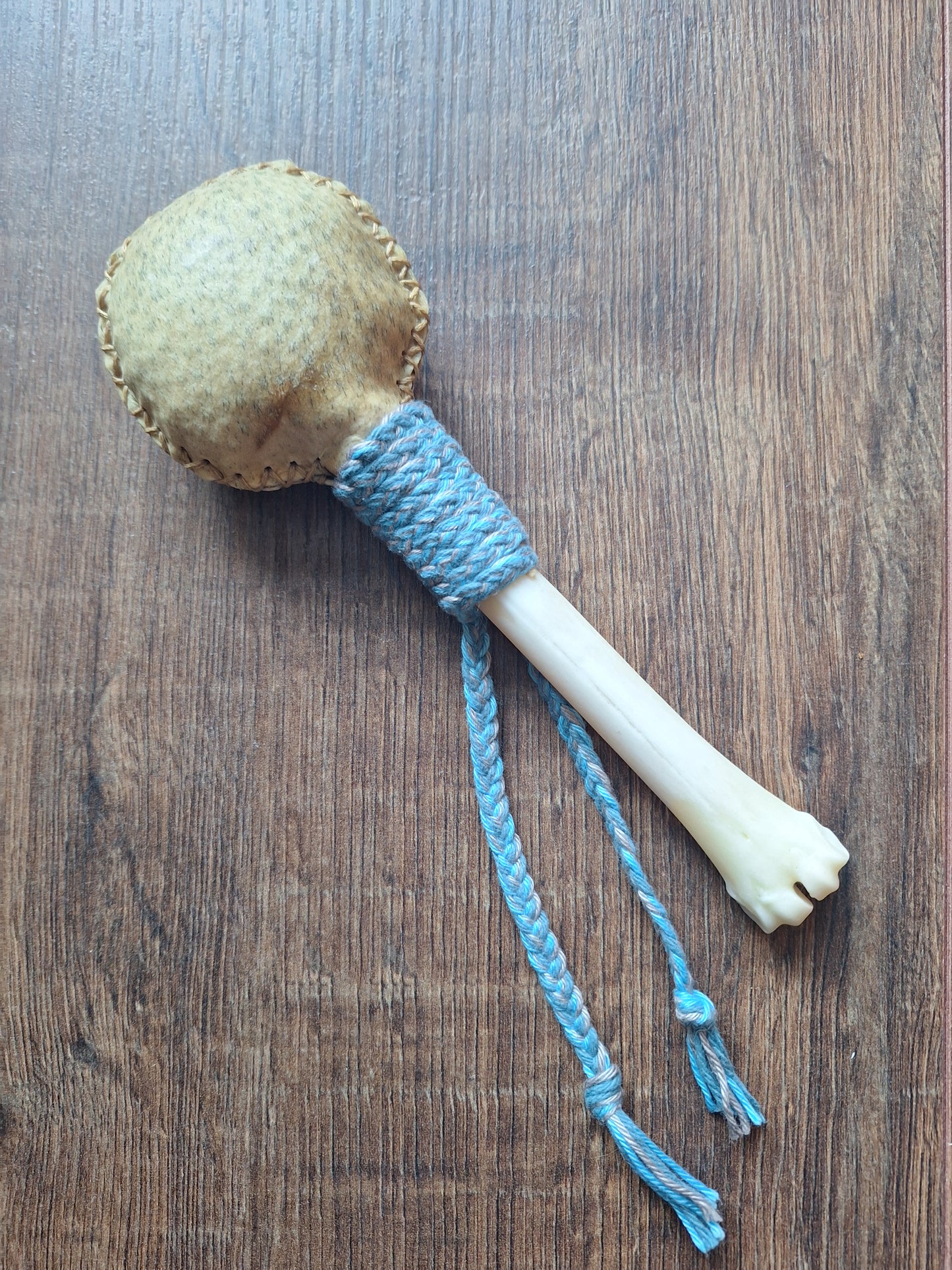 Wild boar hide and red deer leg bone rattle