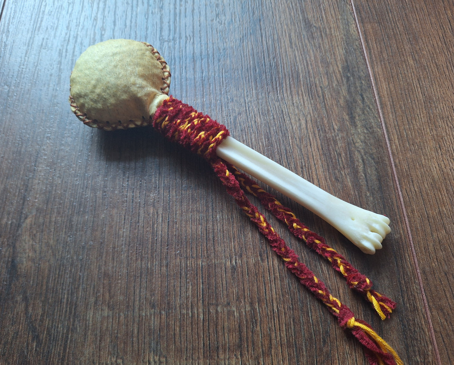 Wild boar hide and roe deer leg bone rattle