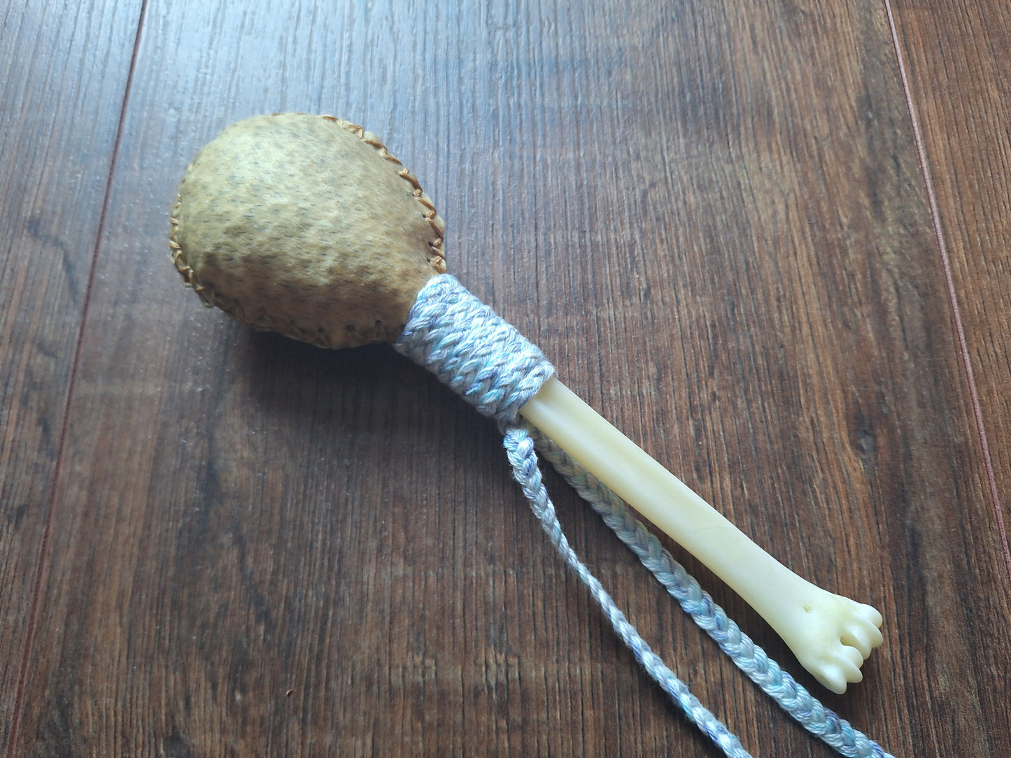 Wild boar hide and roe deer leg bone rattle