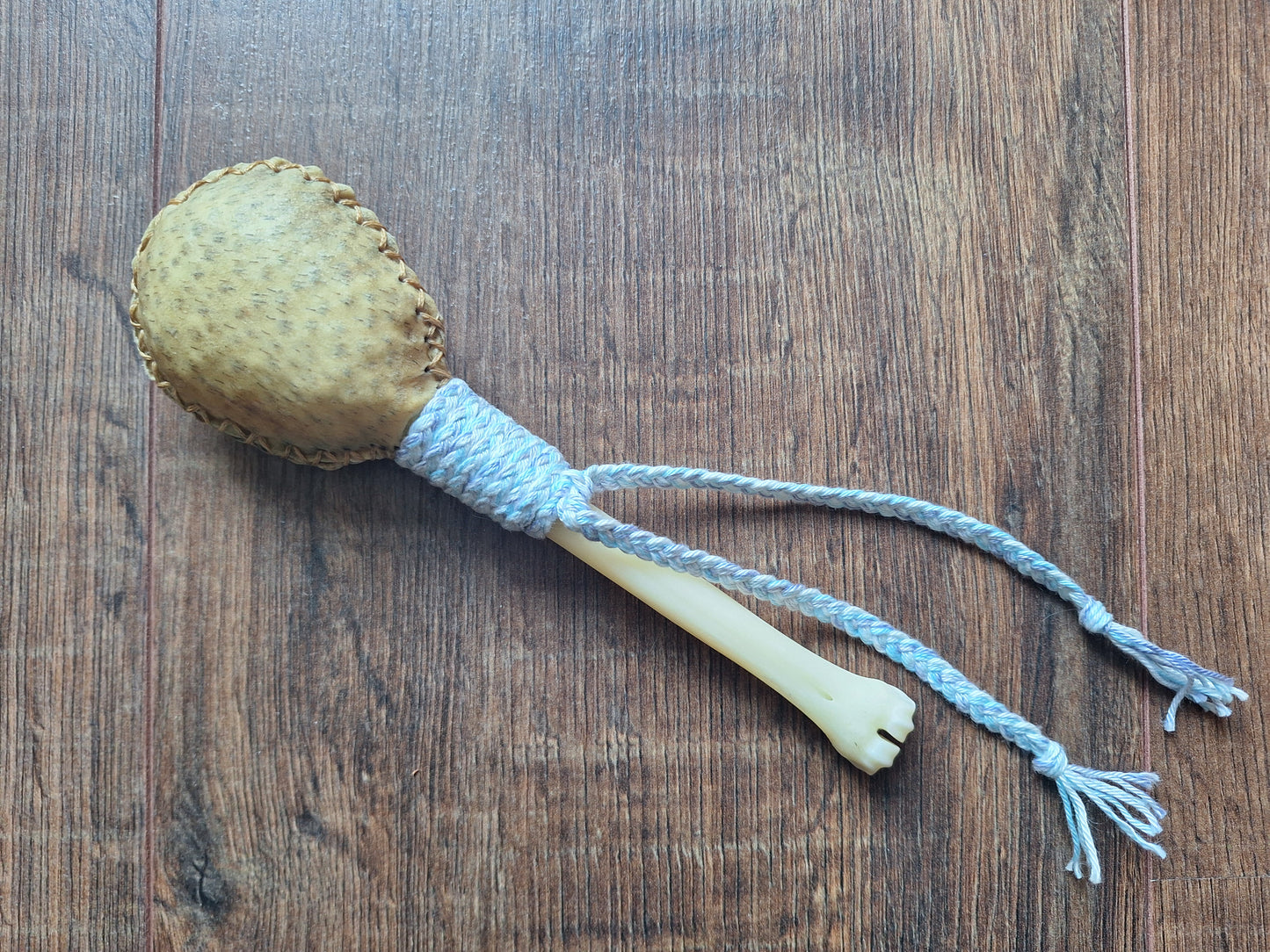 Wild boar hide and roe deer leg bone rattle