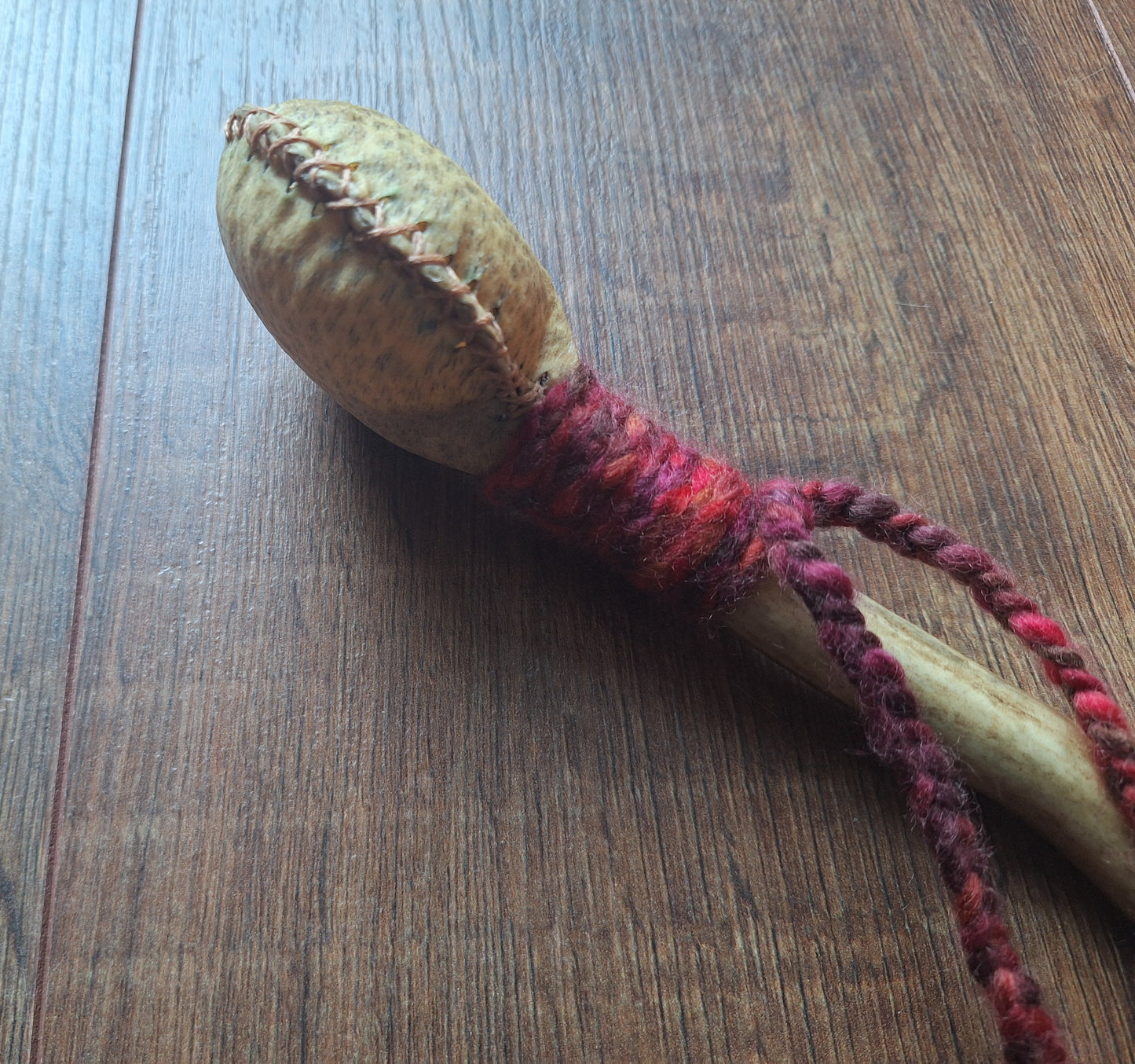 Wild boar hide and red deer antler rattle