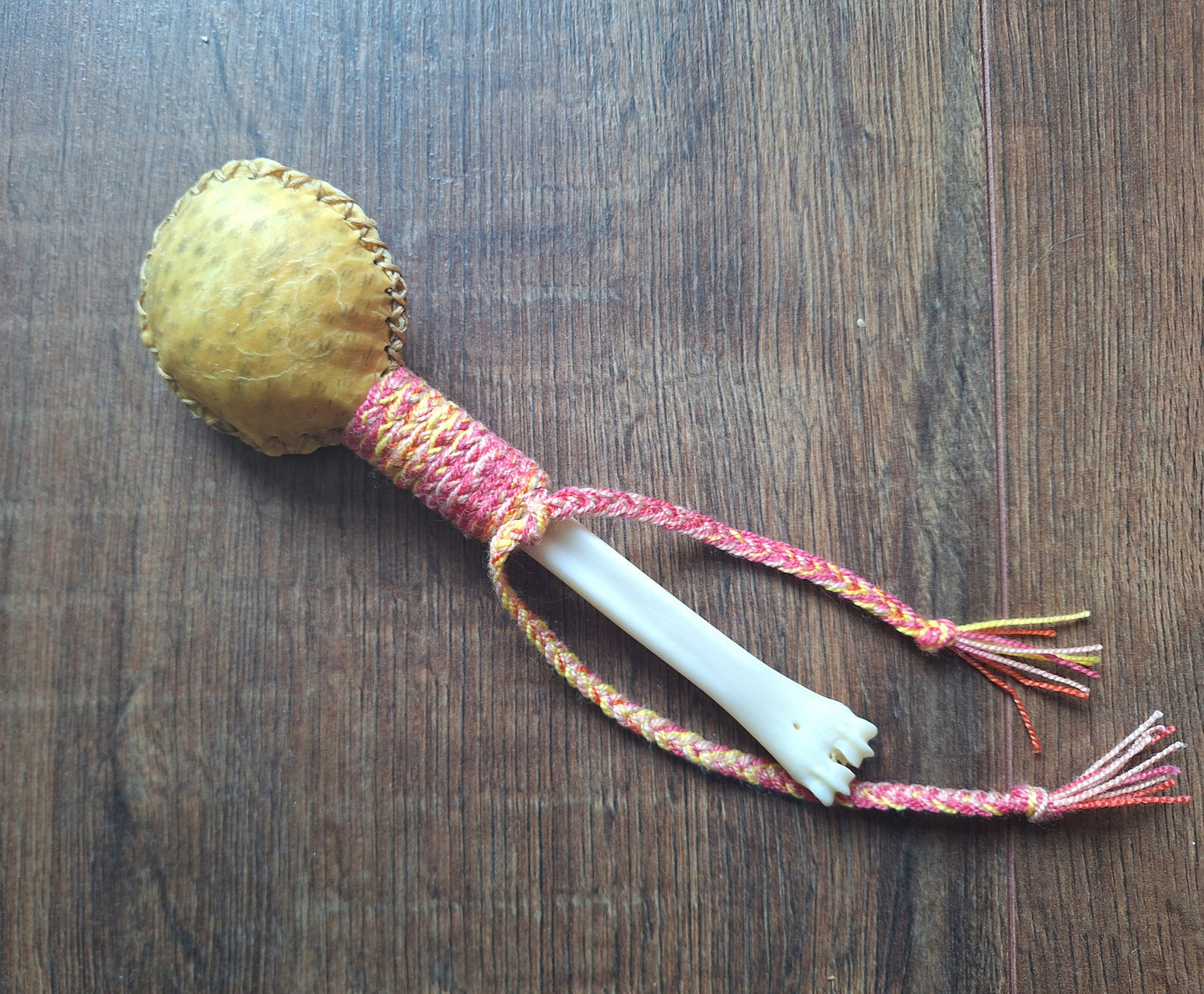 Wild boar hide and roe deer leg bone rattle