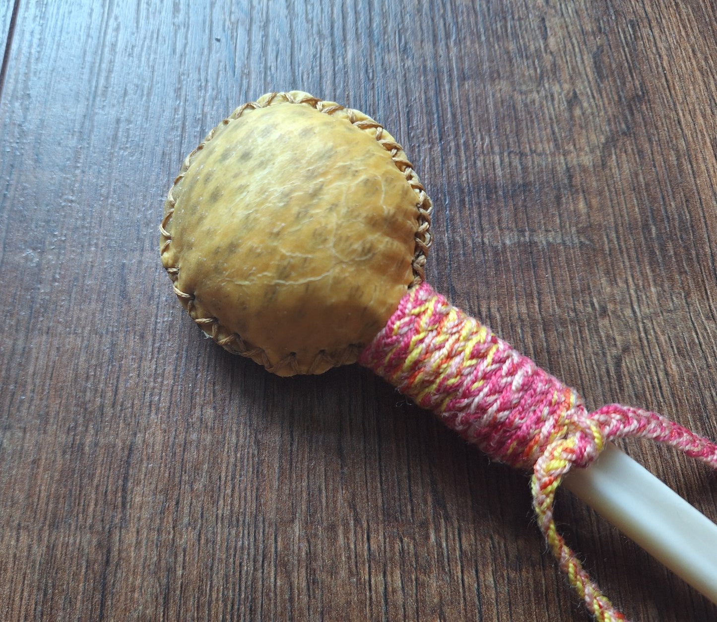 Wild boar hide and roe deer leg bone rattle