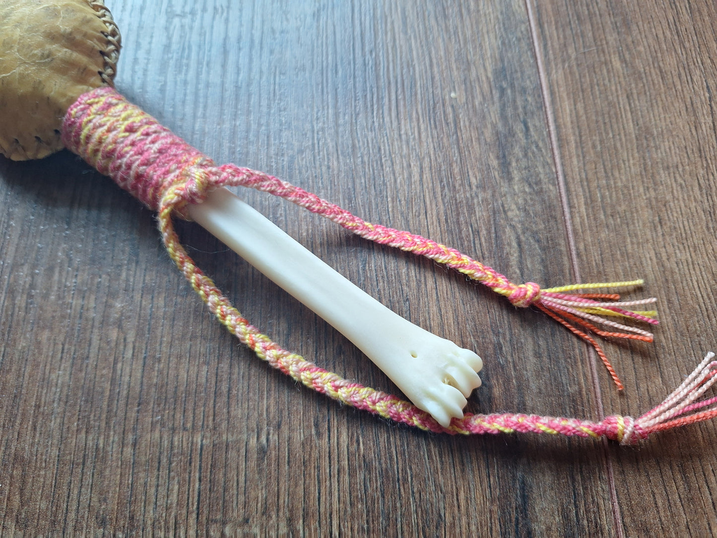 Wild boar hide and roe deer leg bone rattle