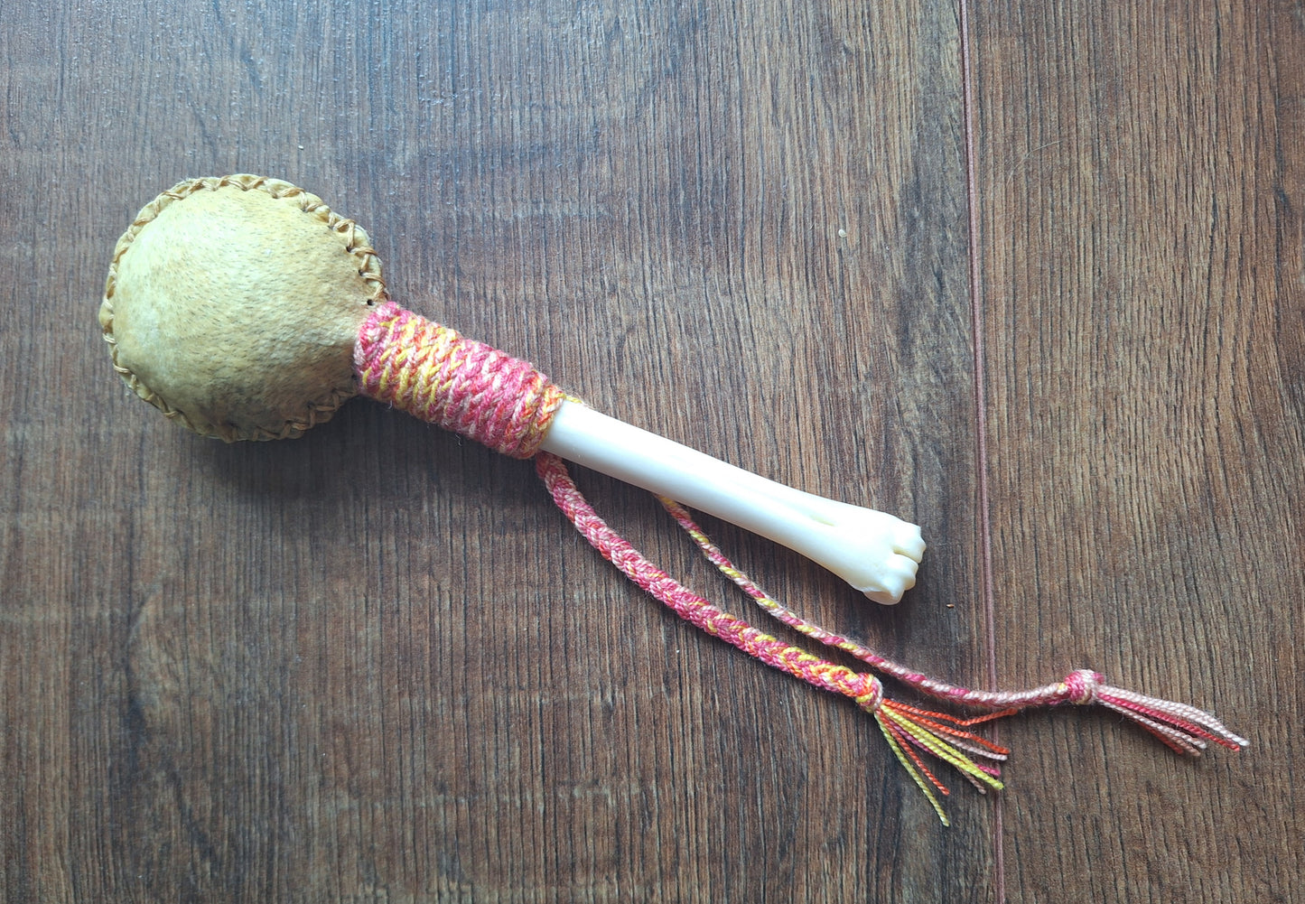 Wild boar hide and roe deer leg bone rattle