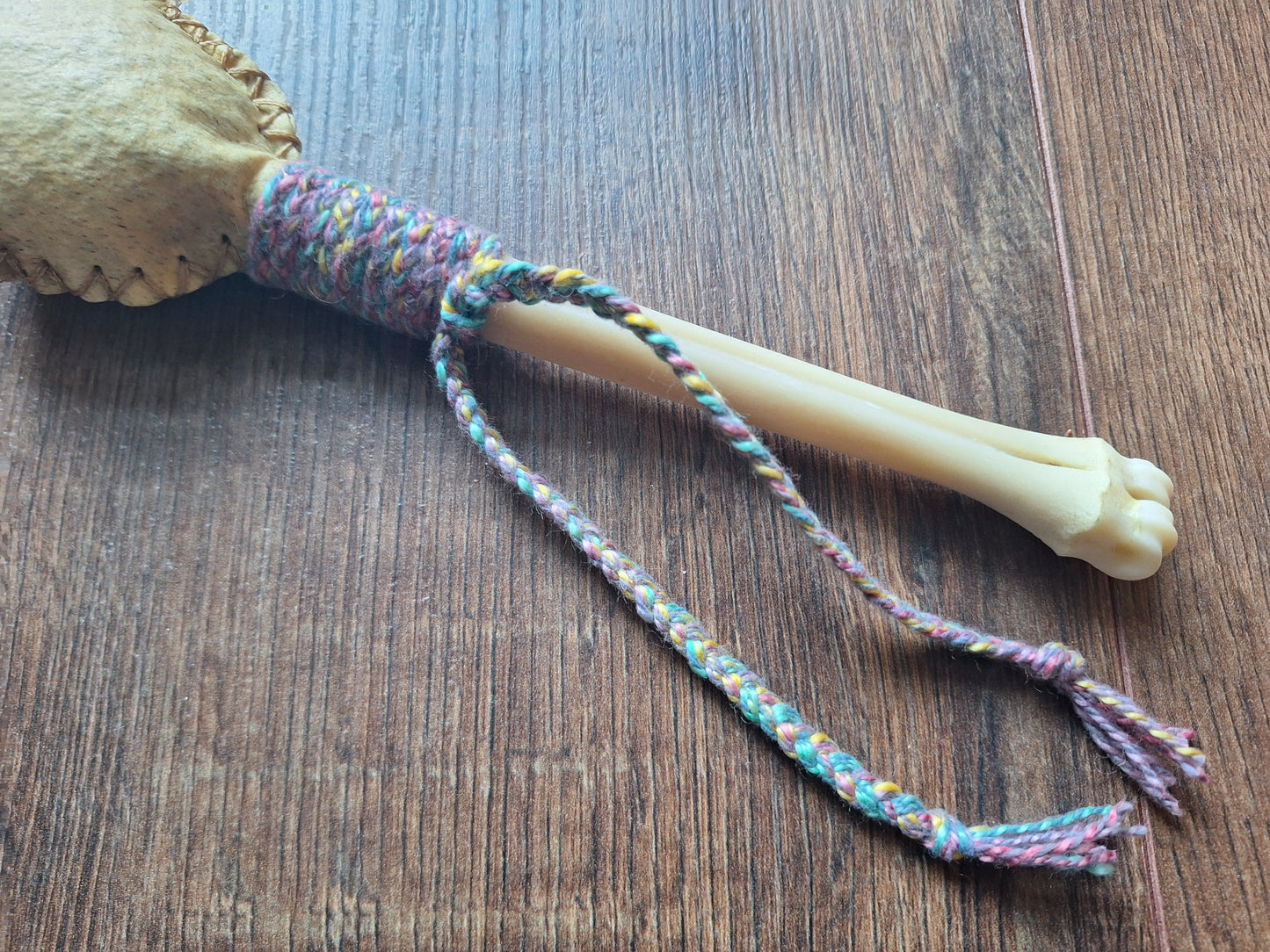 Wild boar hide and red deer leg bone rattle