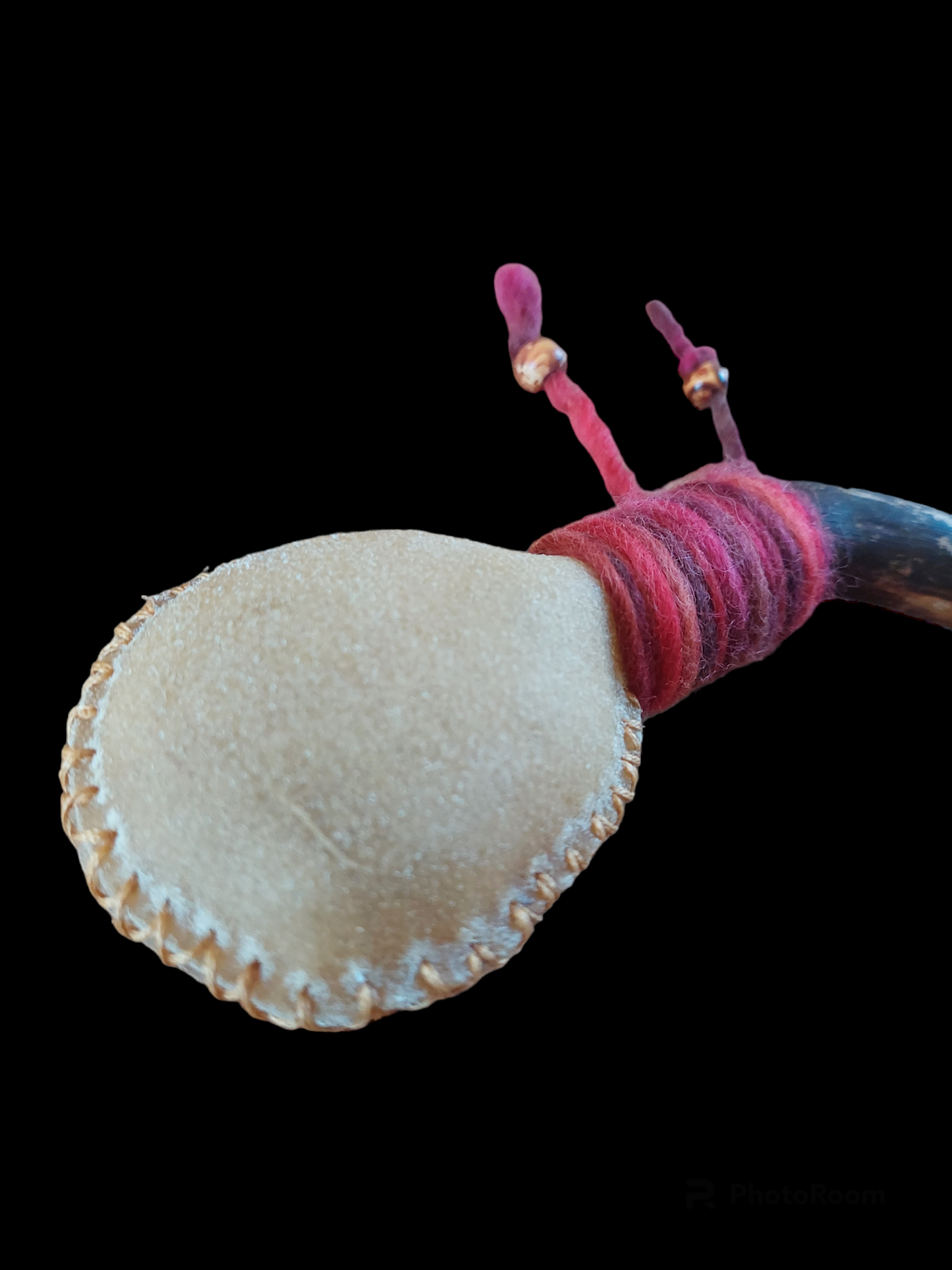 Red deer hide and pine wood rattle