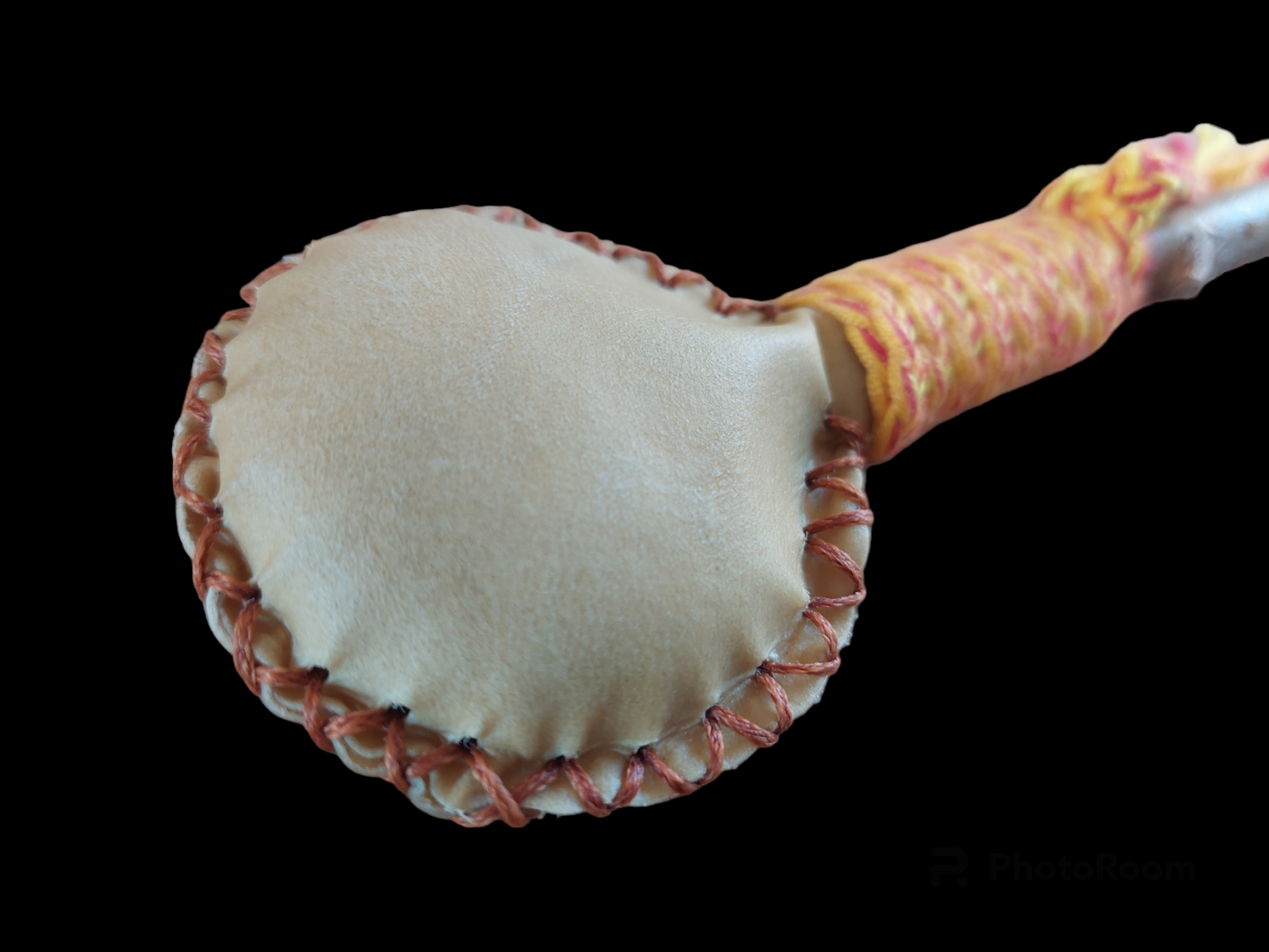 Goat hide and maple wood rattle