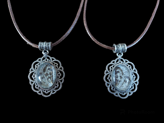 Nettle moth amulet necklace