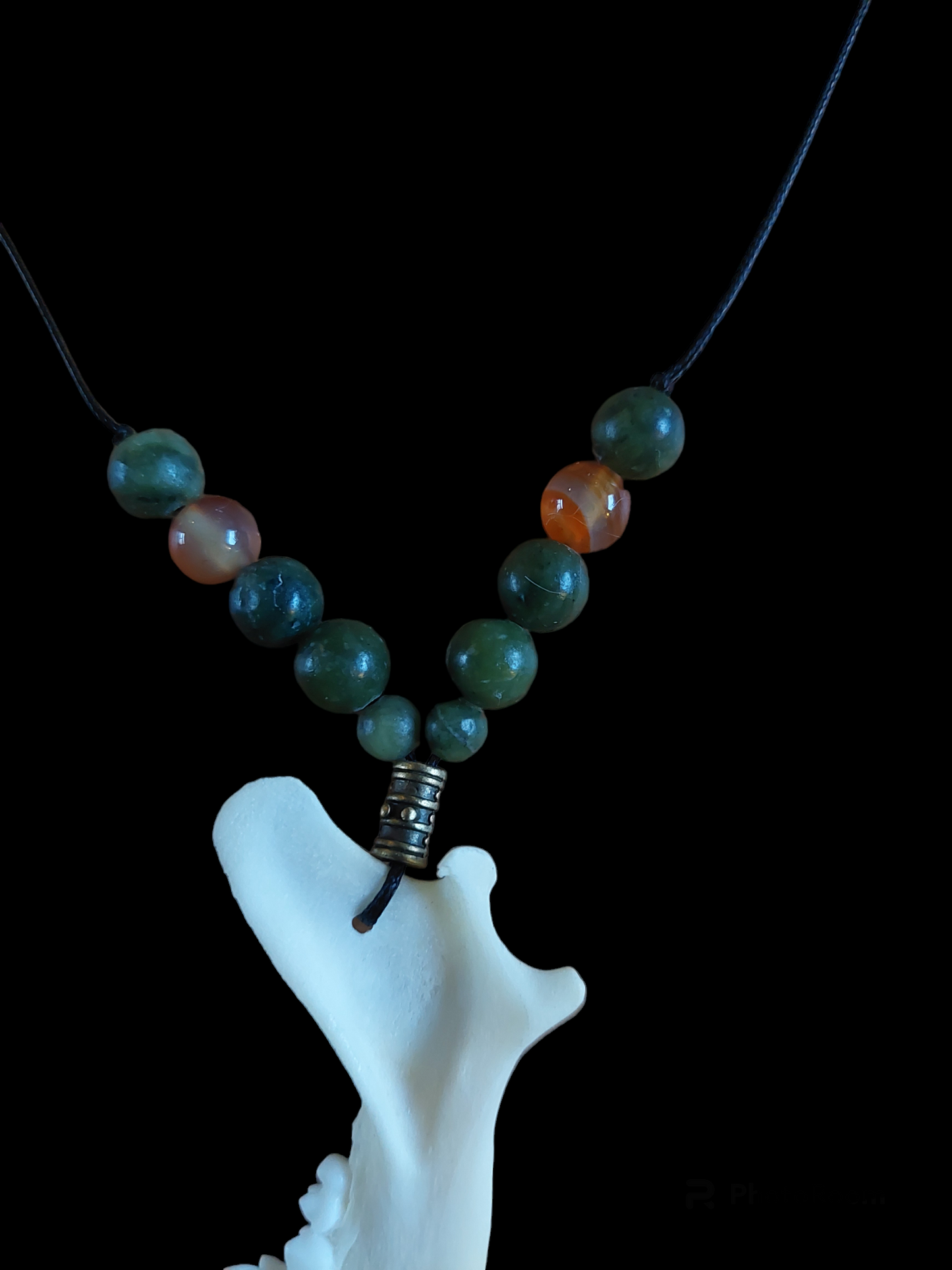 Fox jaw bone with jade and carnelian amulet necklace