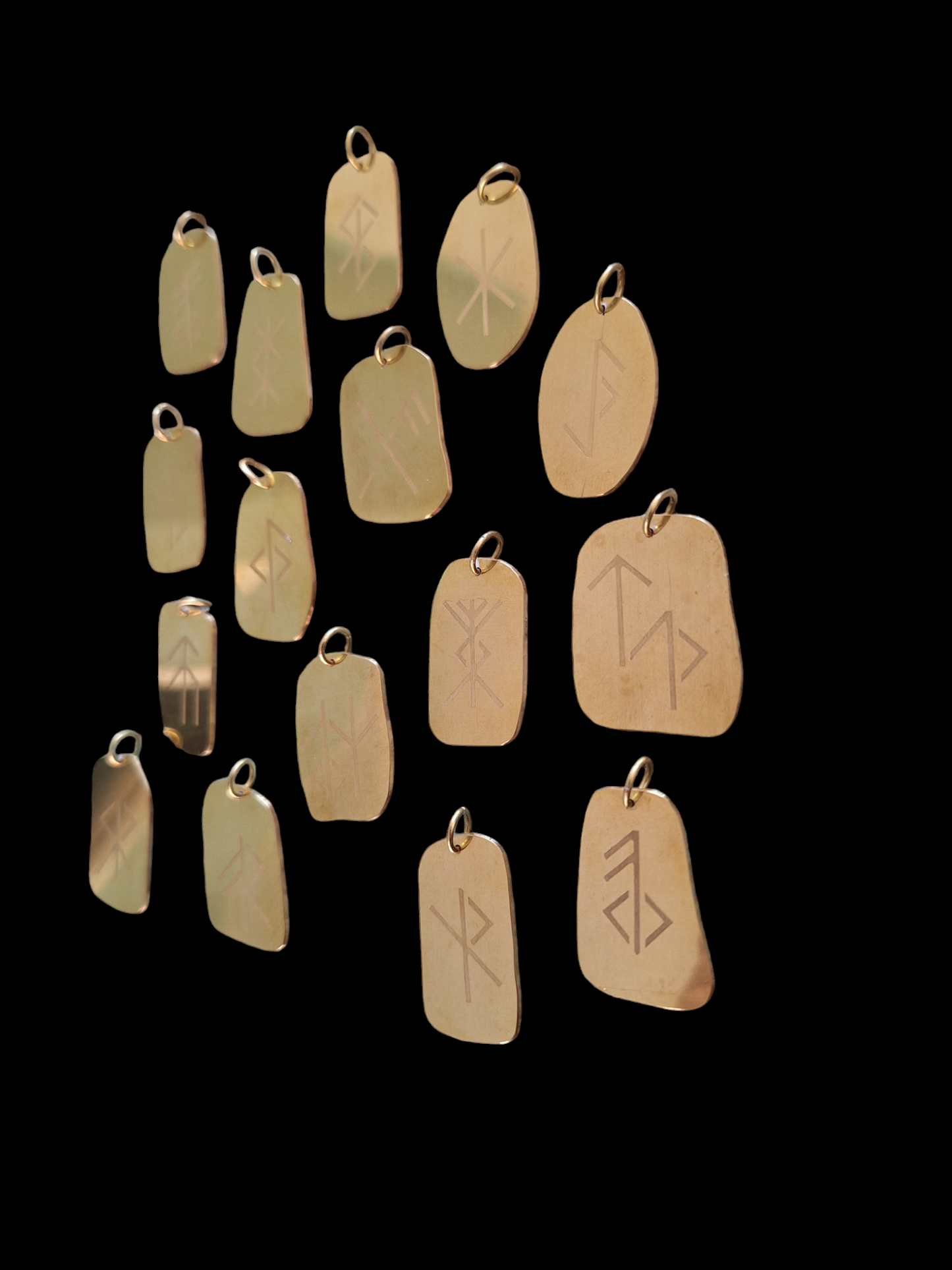 Bind rune pendants by Karak Kam