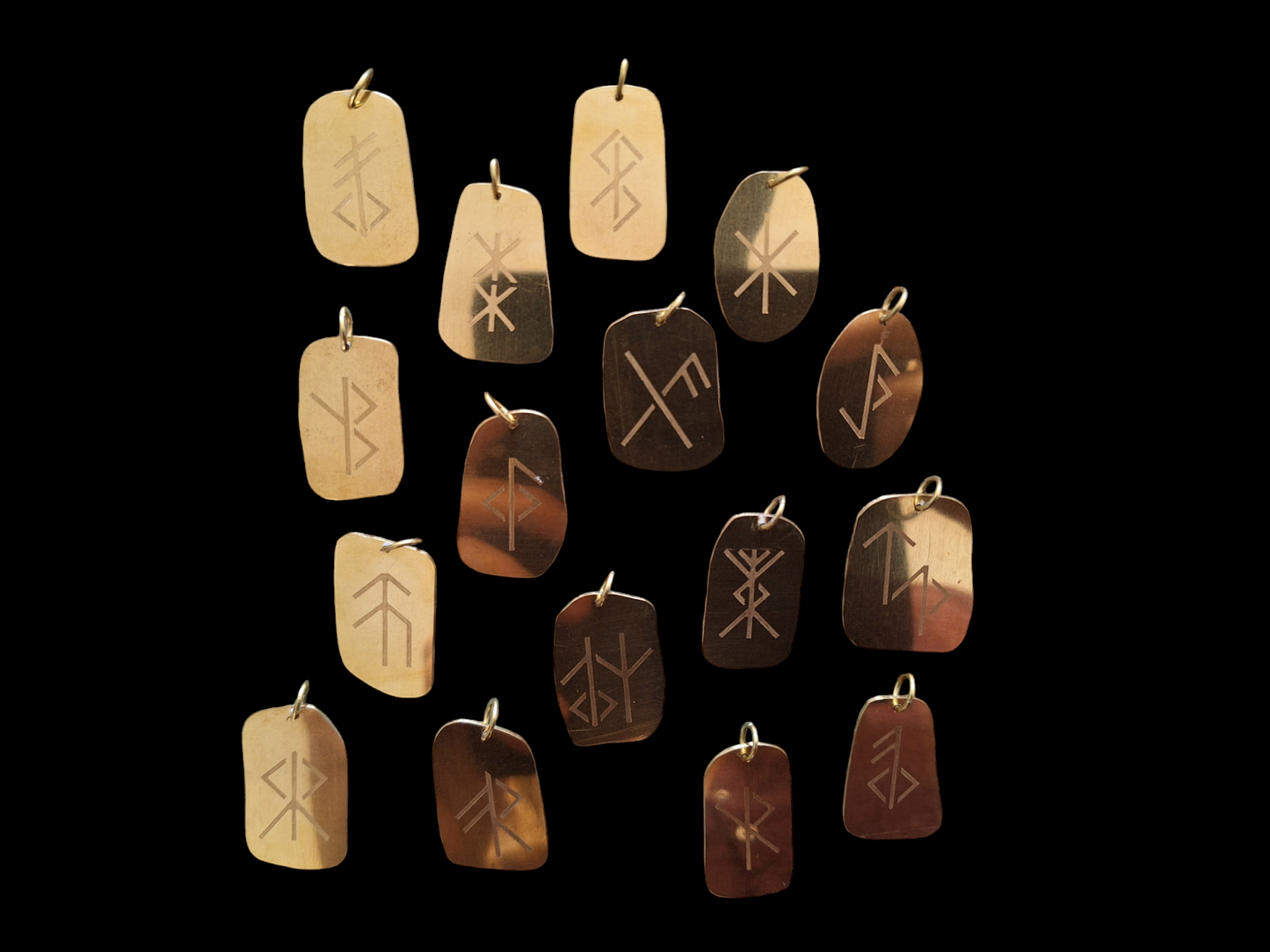 Bind rune pendants by Karak Kam