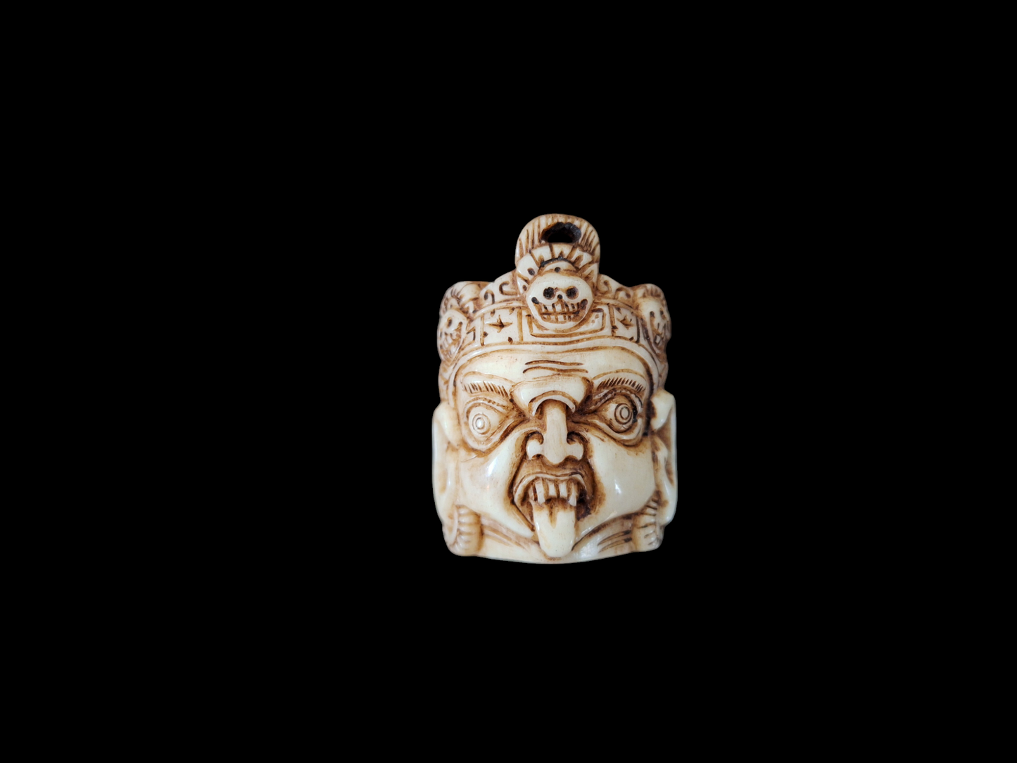 Bone carved Mahakala pendant #2