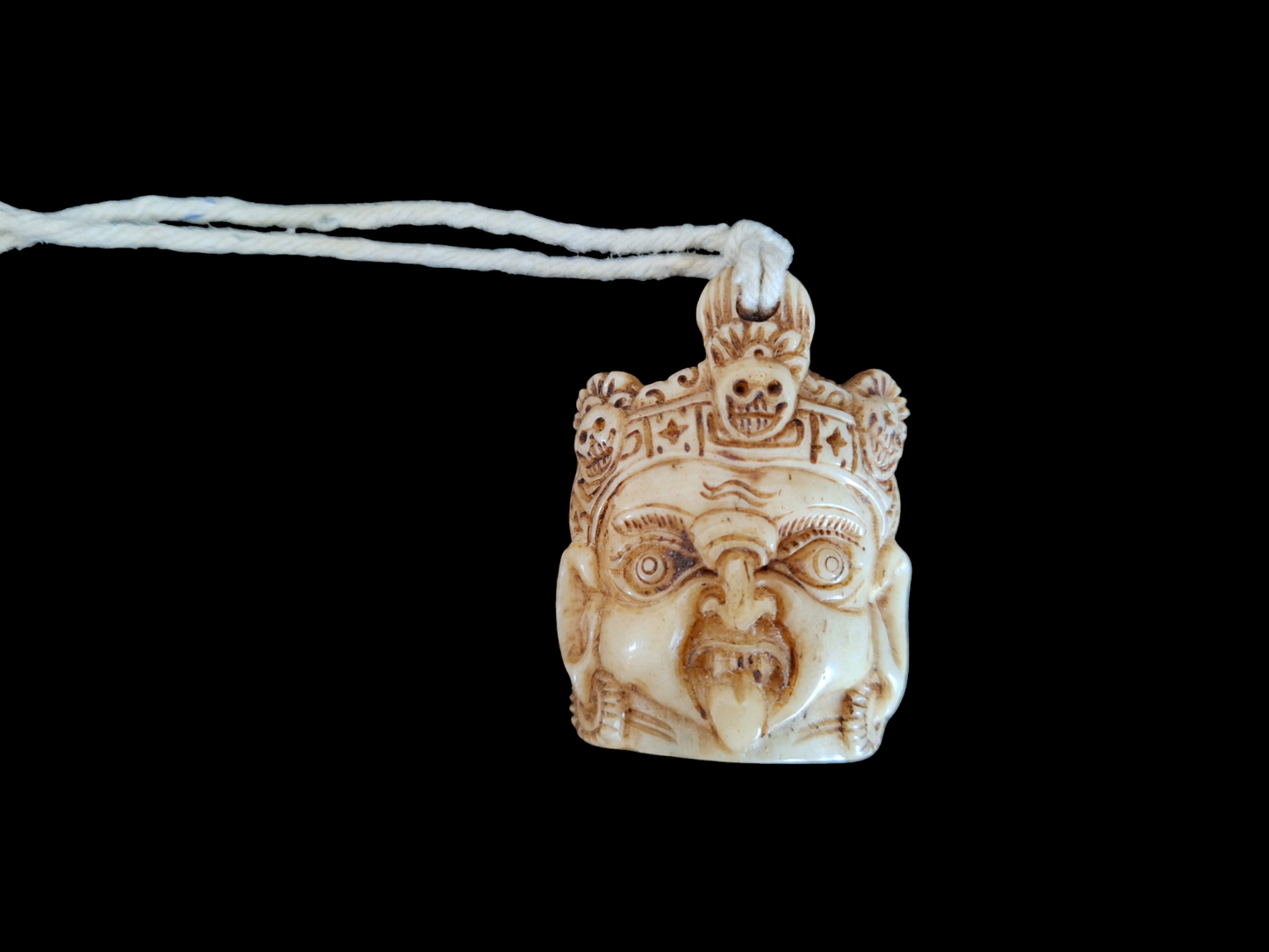 Bone carved Mahakala pendant #2