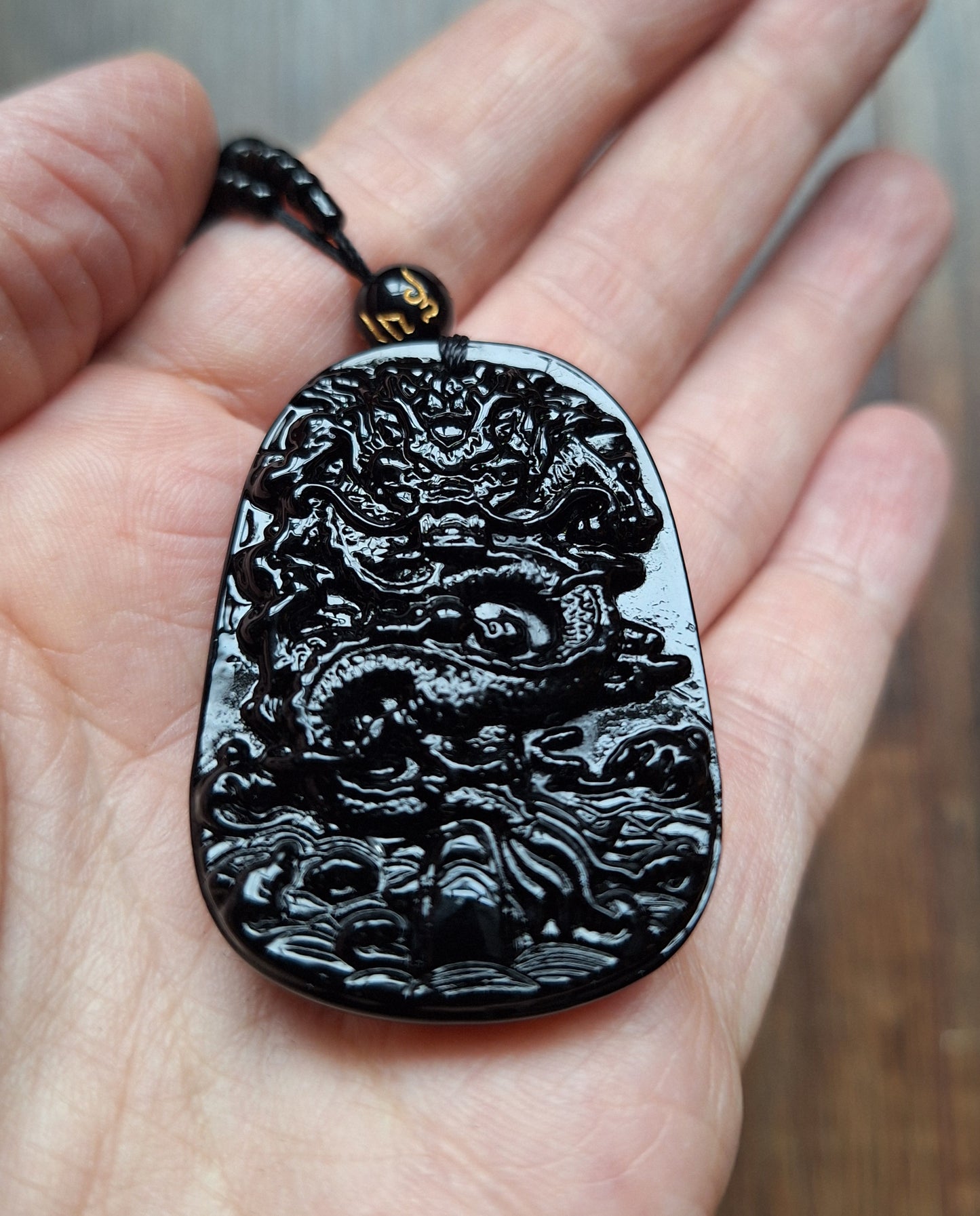 Black glass necklace with Dragon pendant