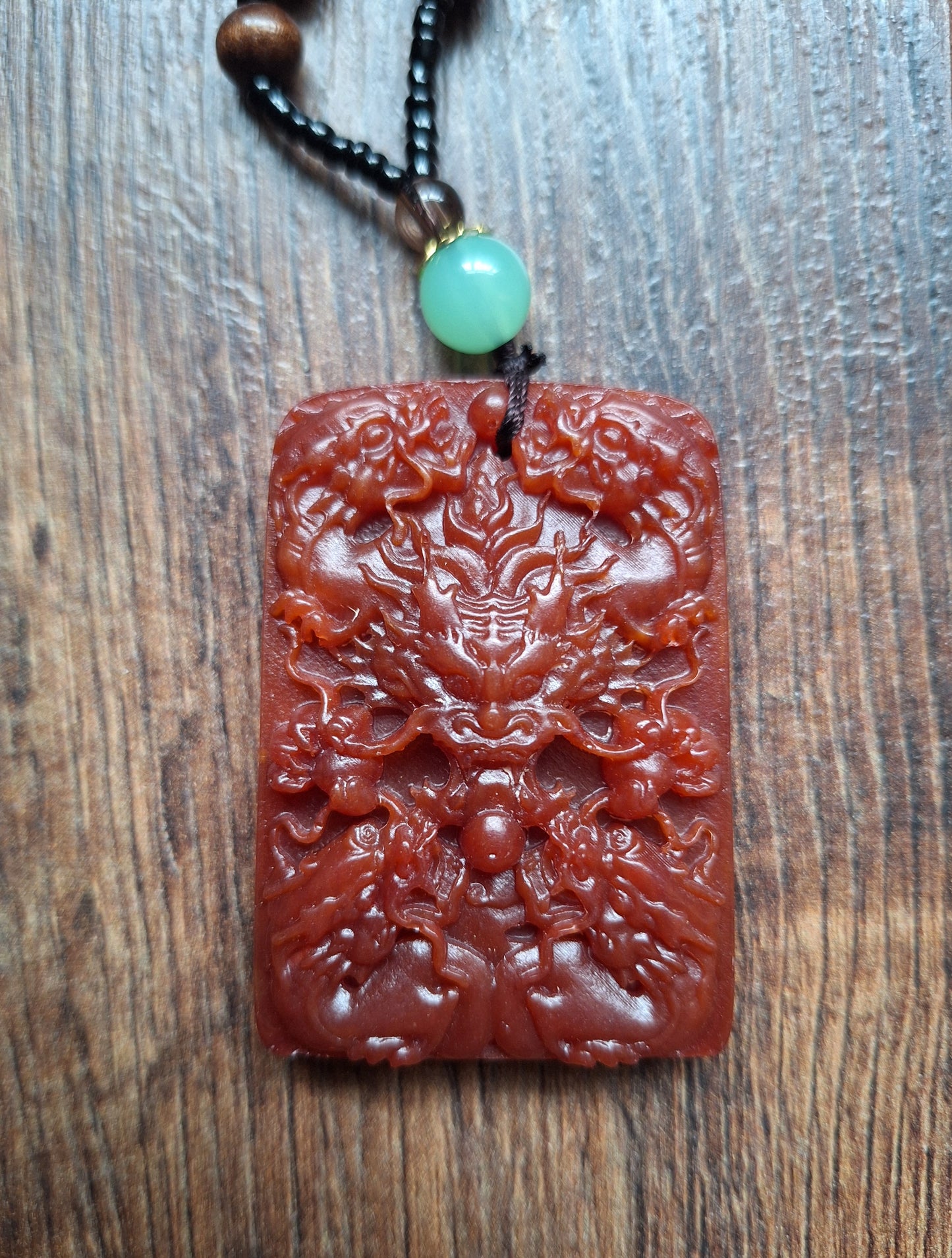 Necklace with resin dragon pendant