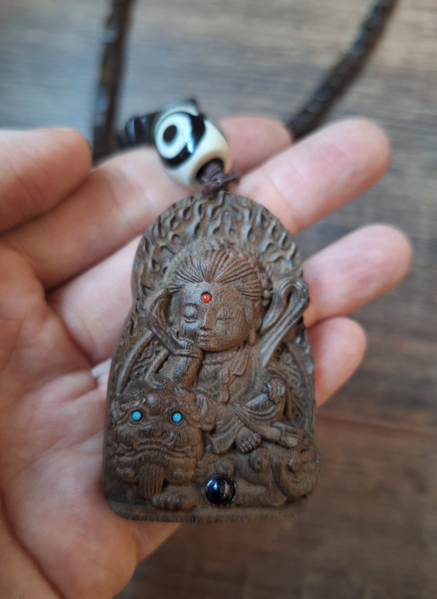 Wooden mala with Guanyin pendant
