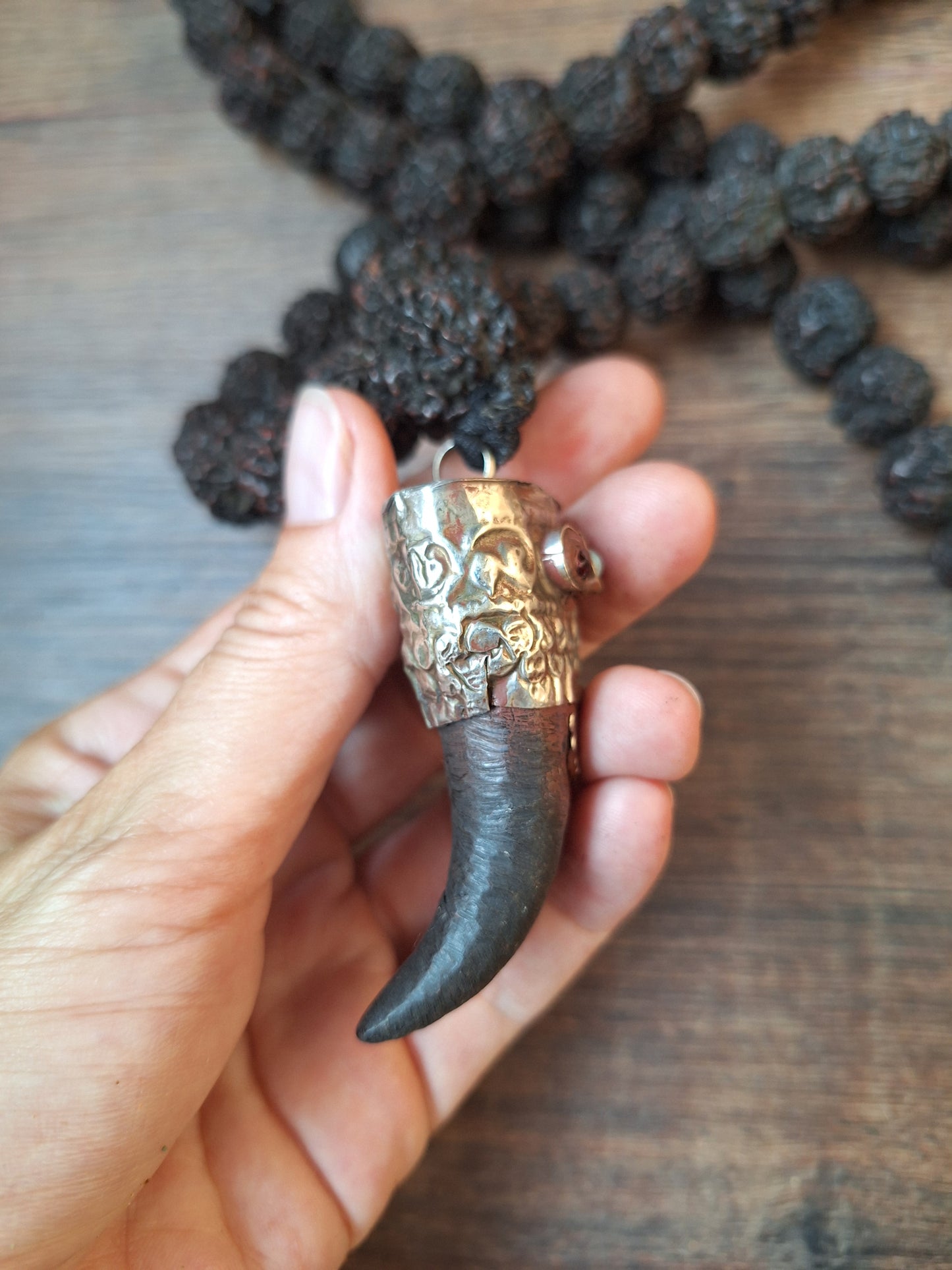 Vintage Nepalese rudraksha mala with horn pendant