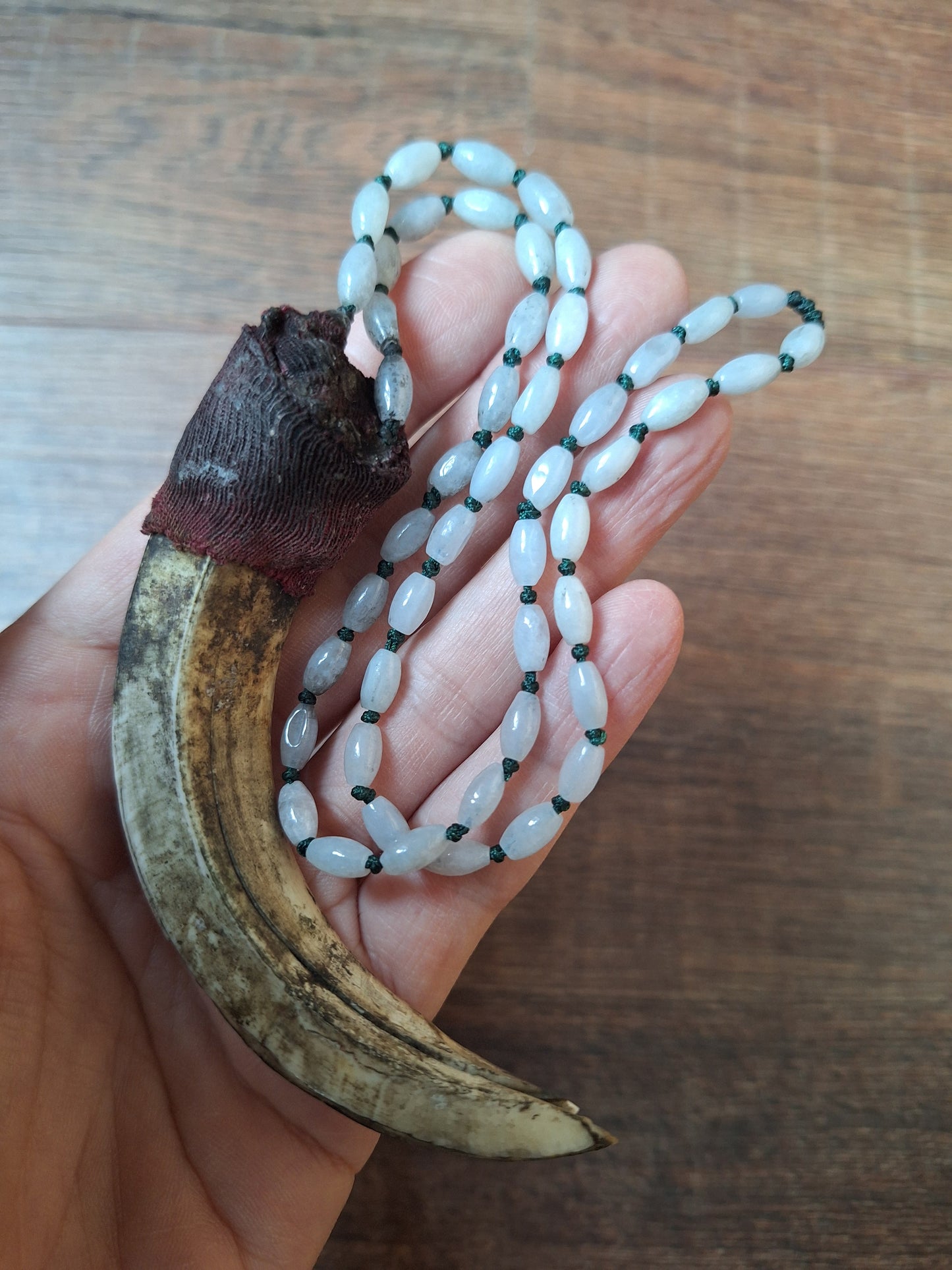Vintage Nepalese snow quartz necklace with wild boar tooth pendant