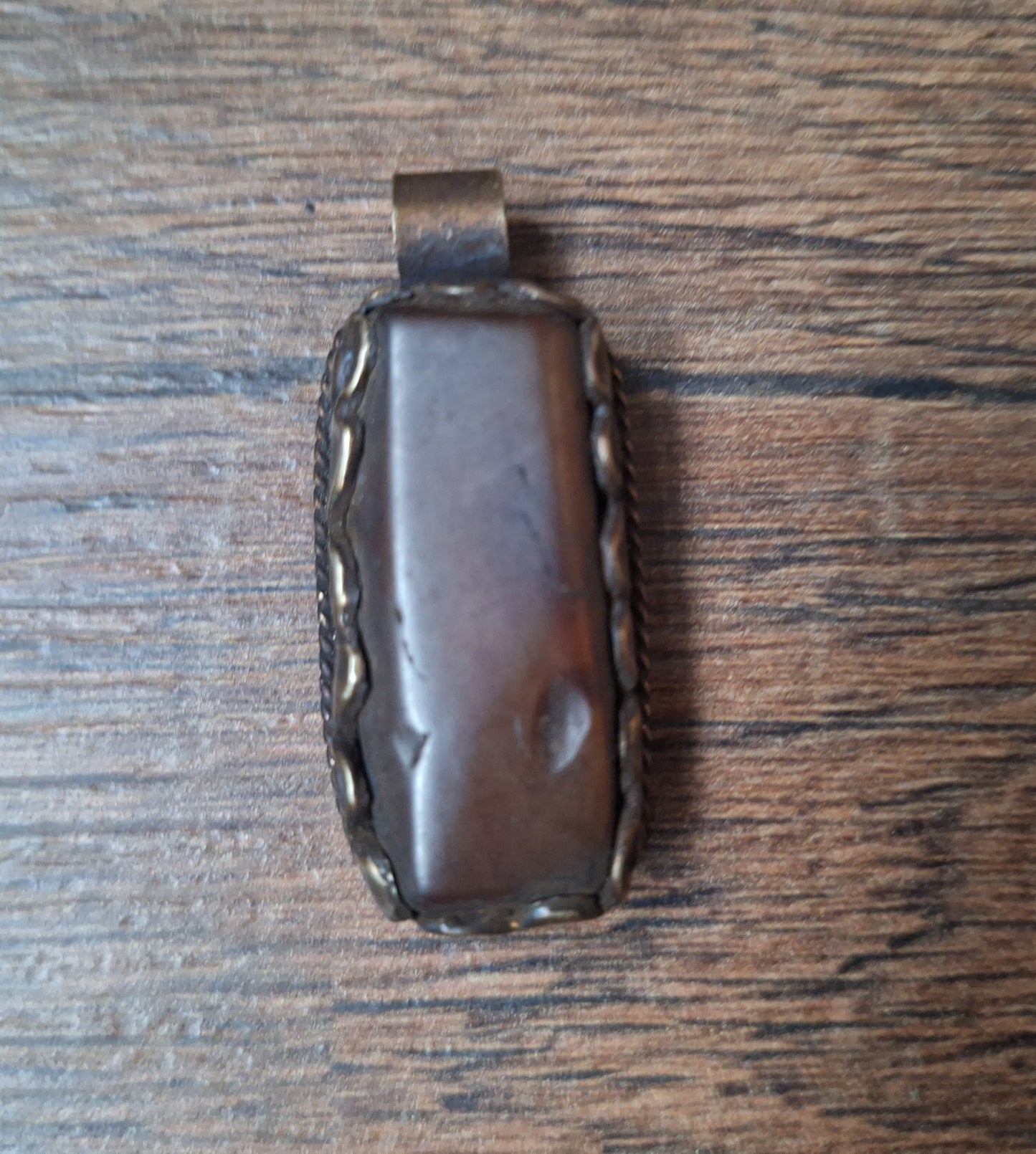 Vintage Tibetan silver and amber pendant