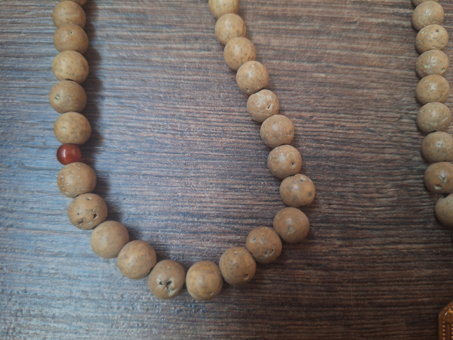 Vintage bodhi seed mala with Feet of the Buddha pendant