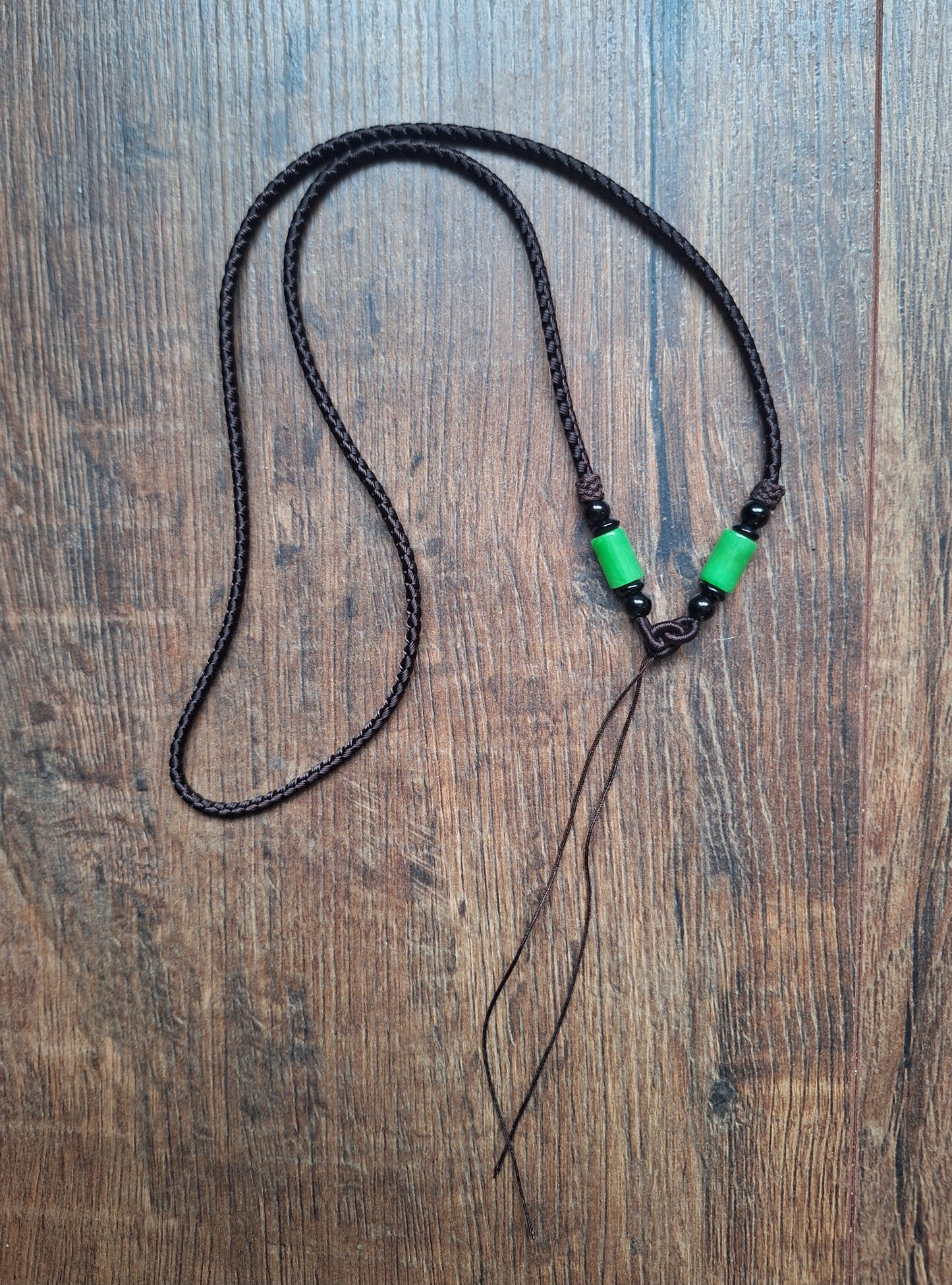 Amulet cord brown with jade beads