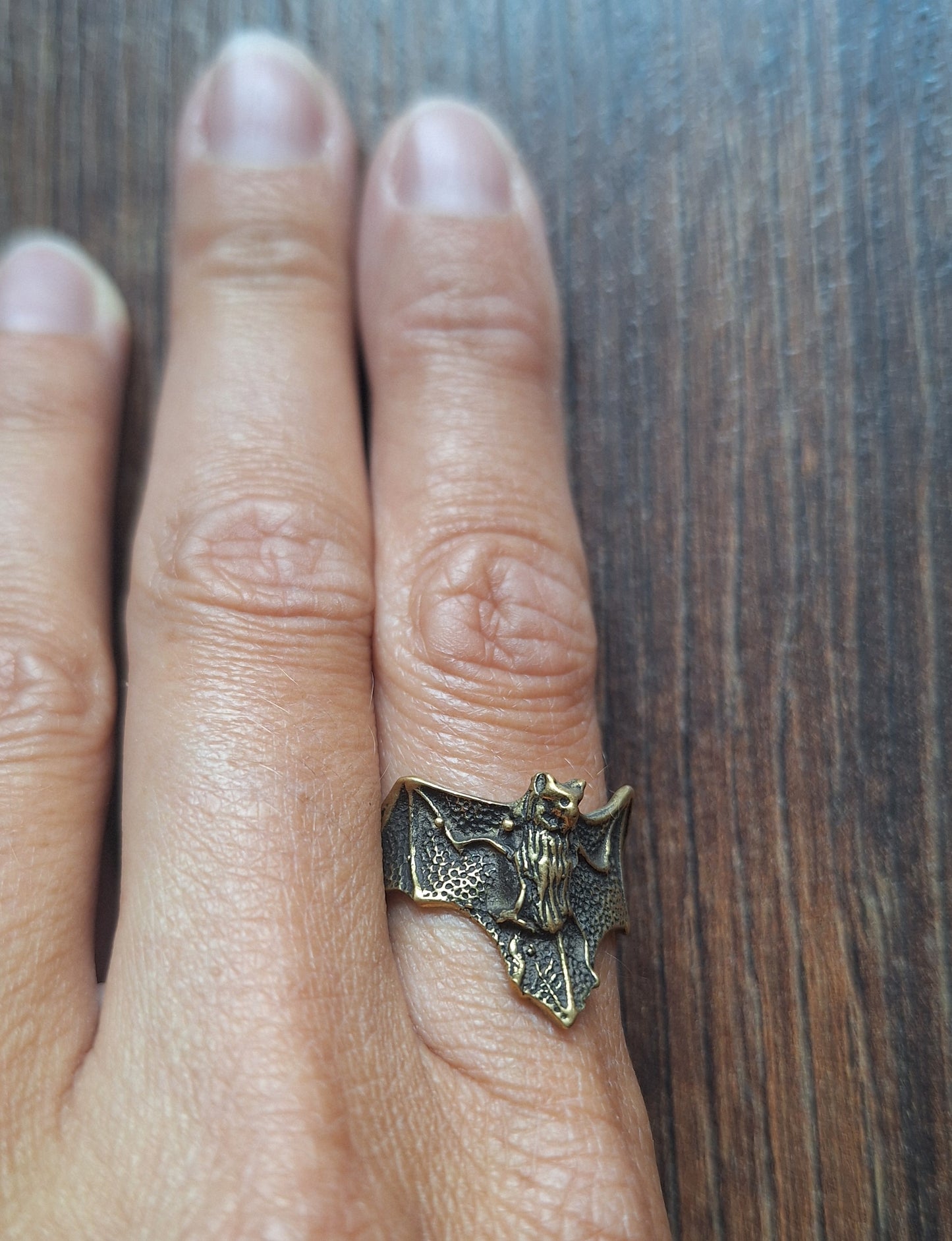 Brass ring Bat