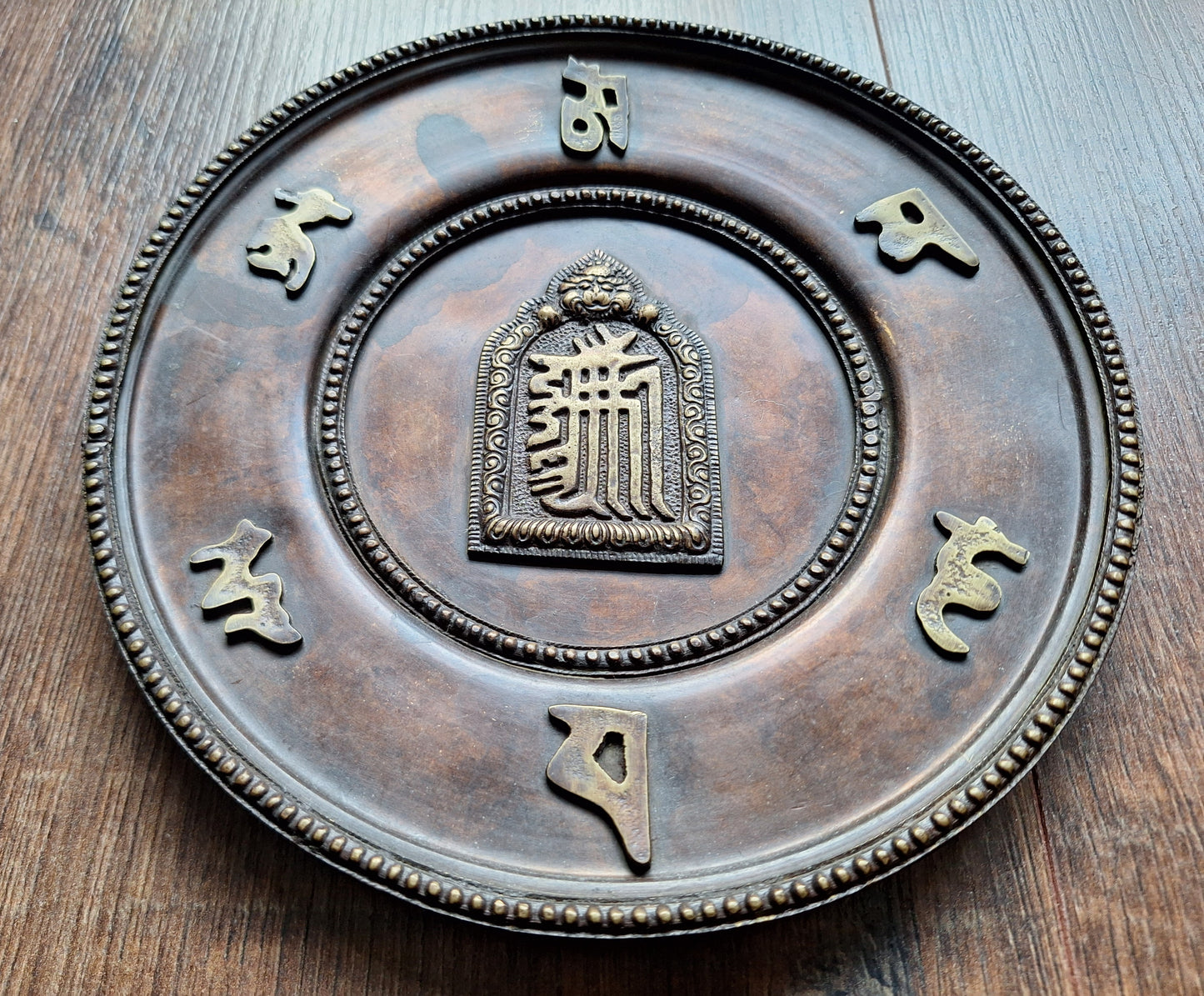 Red copper wallhanger Kalachakra