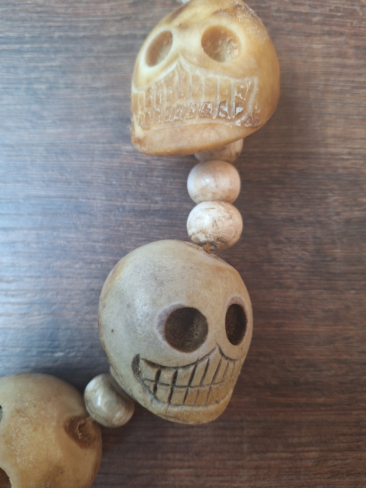 Vintage bone carved skull necklace
