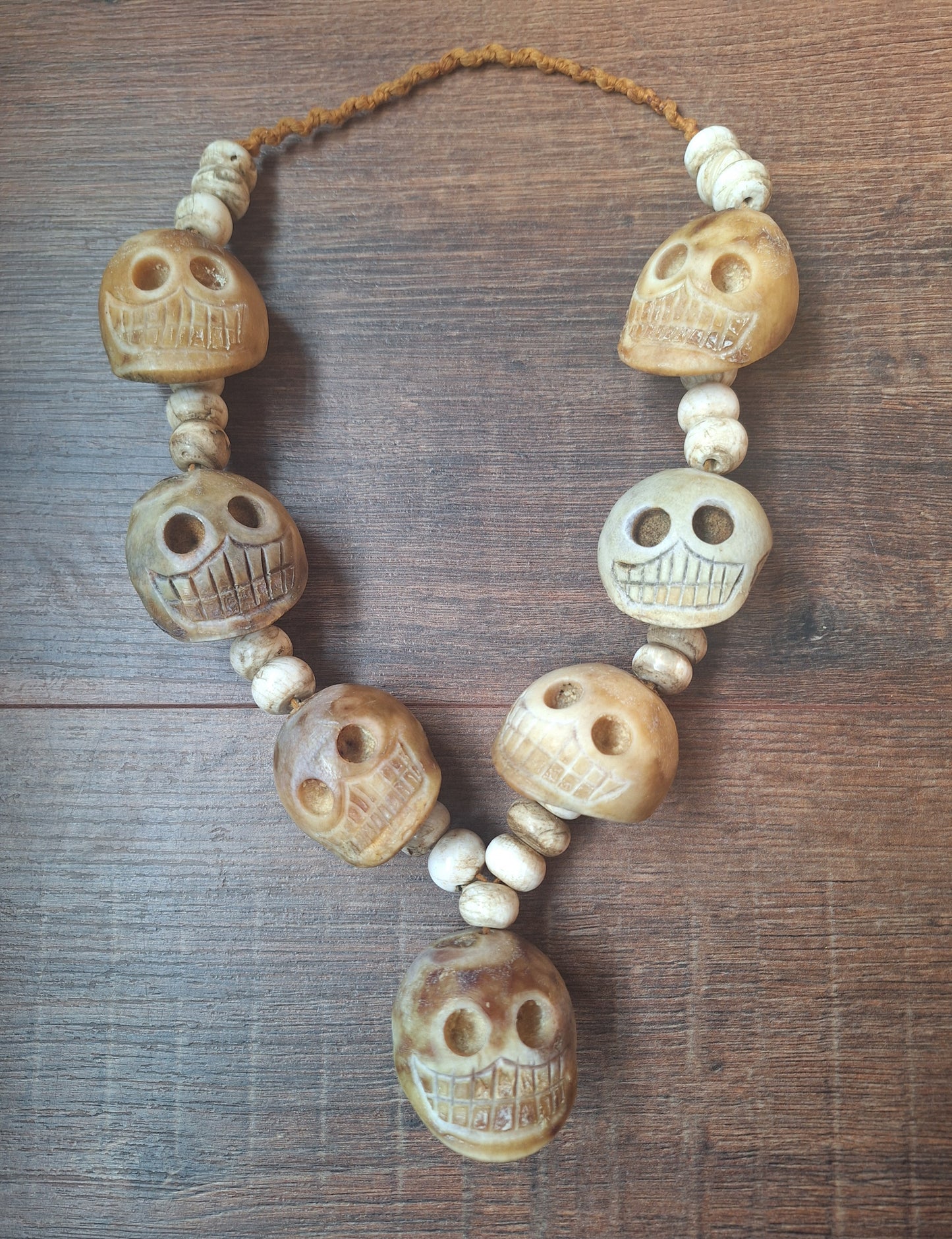 Vintage bone carved skull necklace