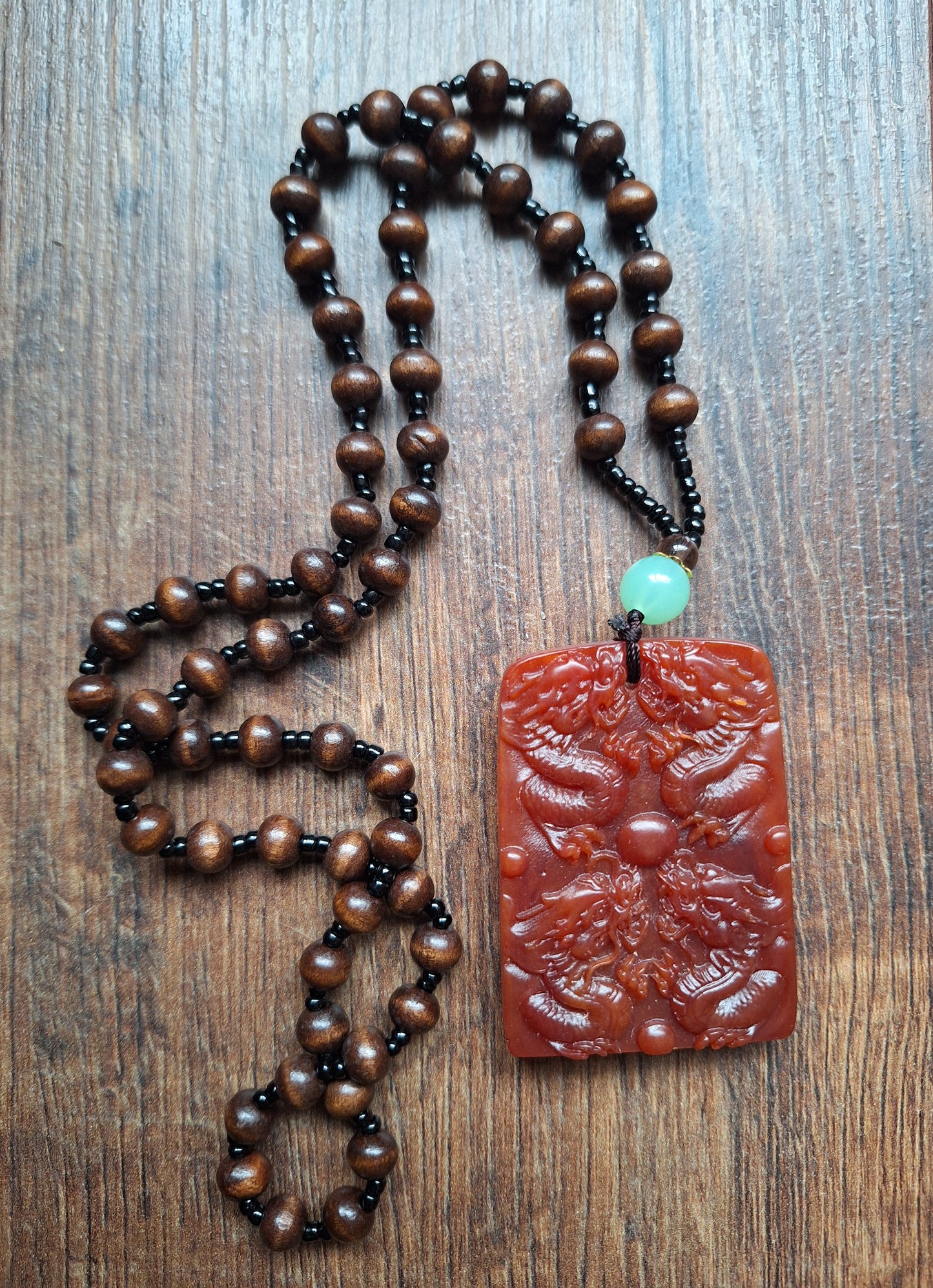 Necklace with resin dragon pendant