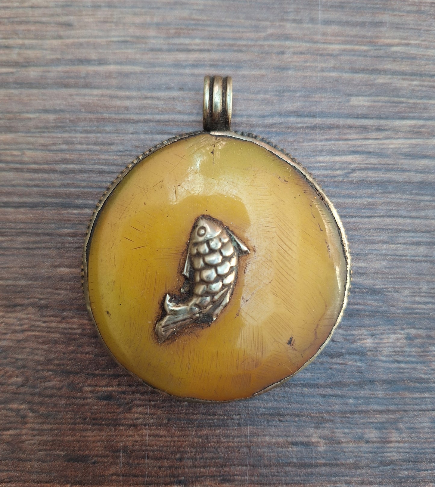 Vintage Tibetan silver and copal pendant