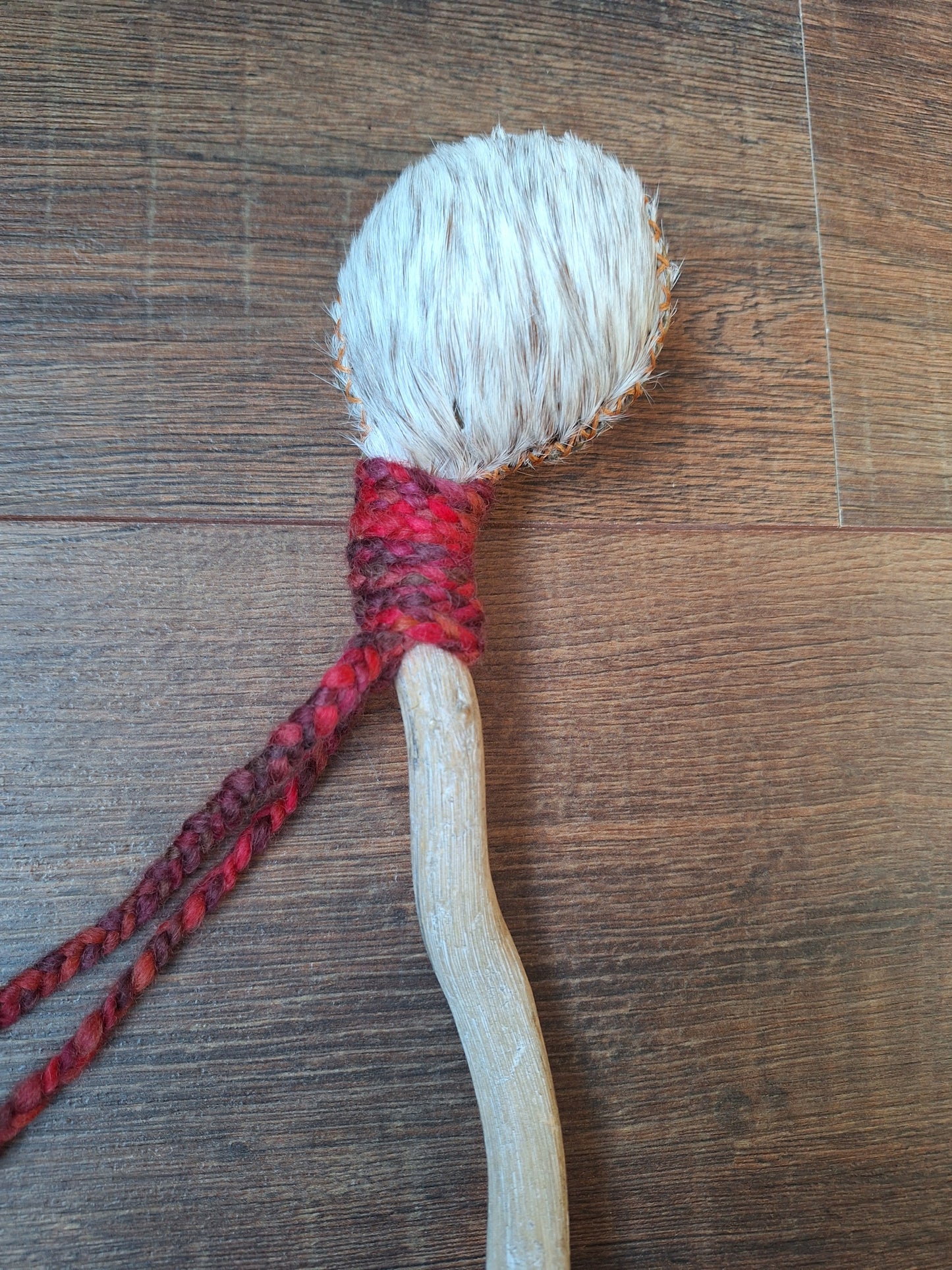 Horse hide and driftwood rattle