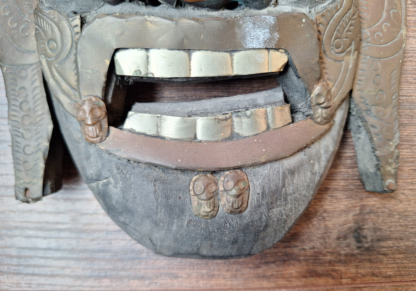 Old wooden Mahakala mask with metal plating