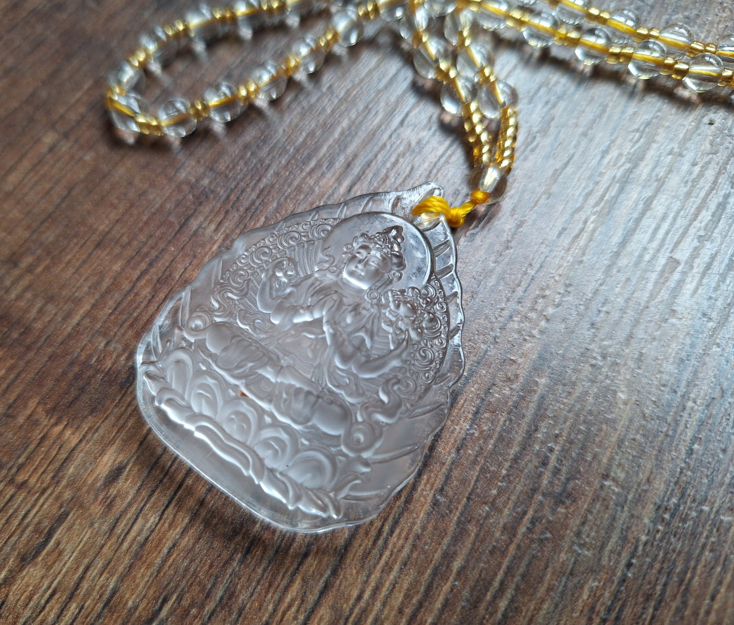 Glass necklace with Guanyin pendant