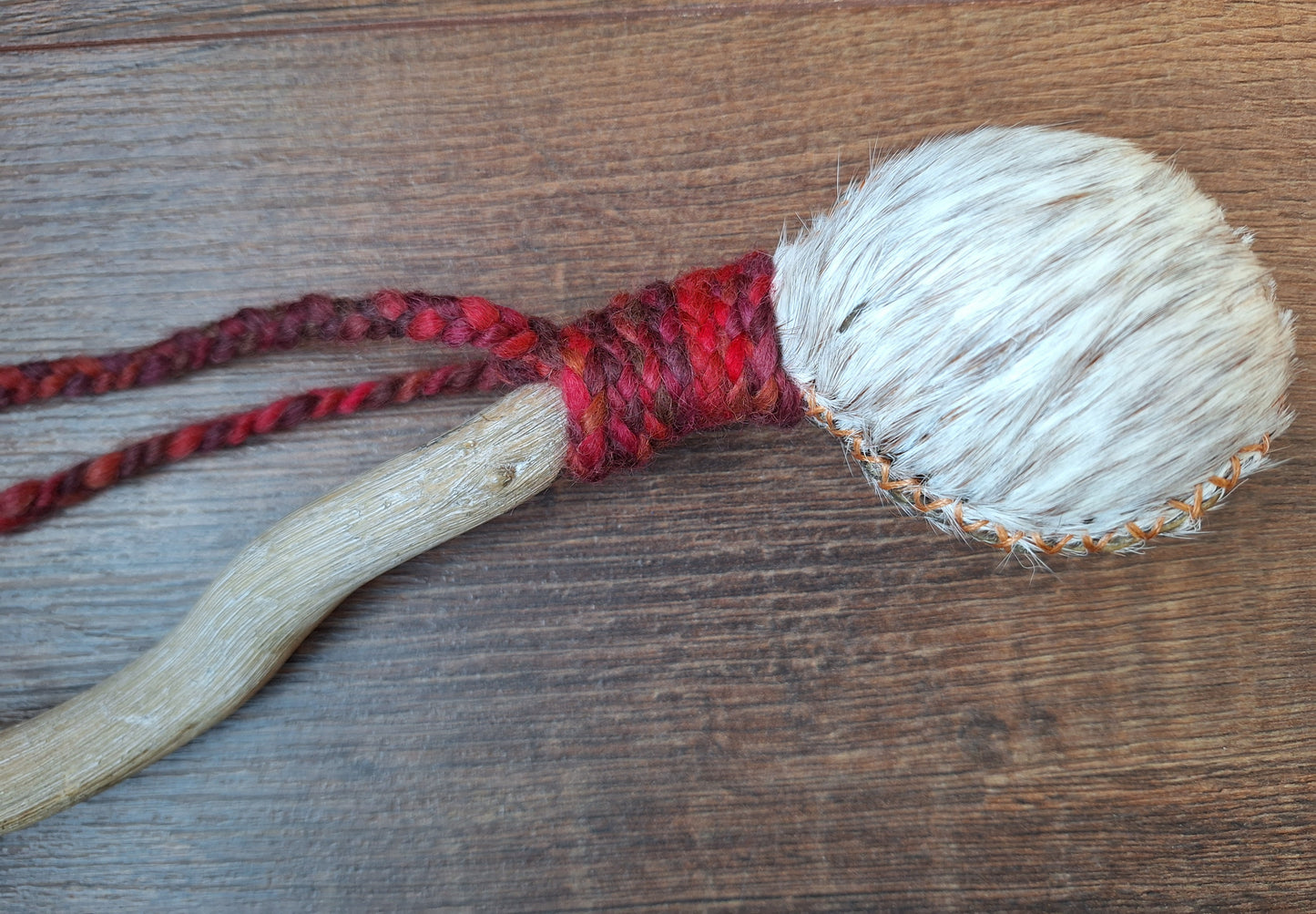 Horse hide and driftwood rattle