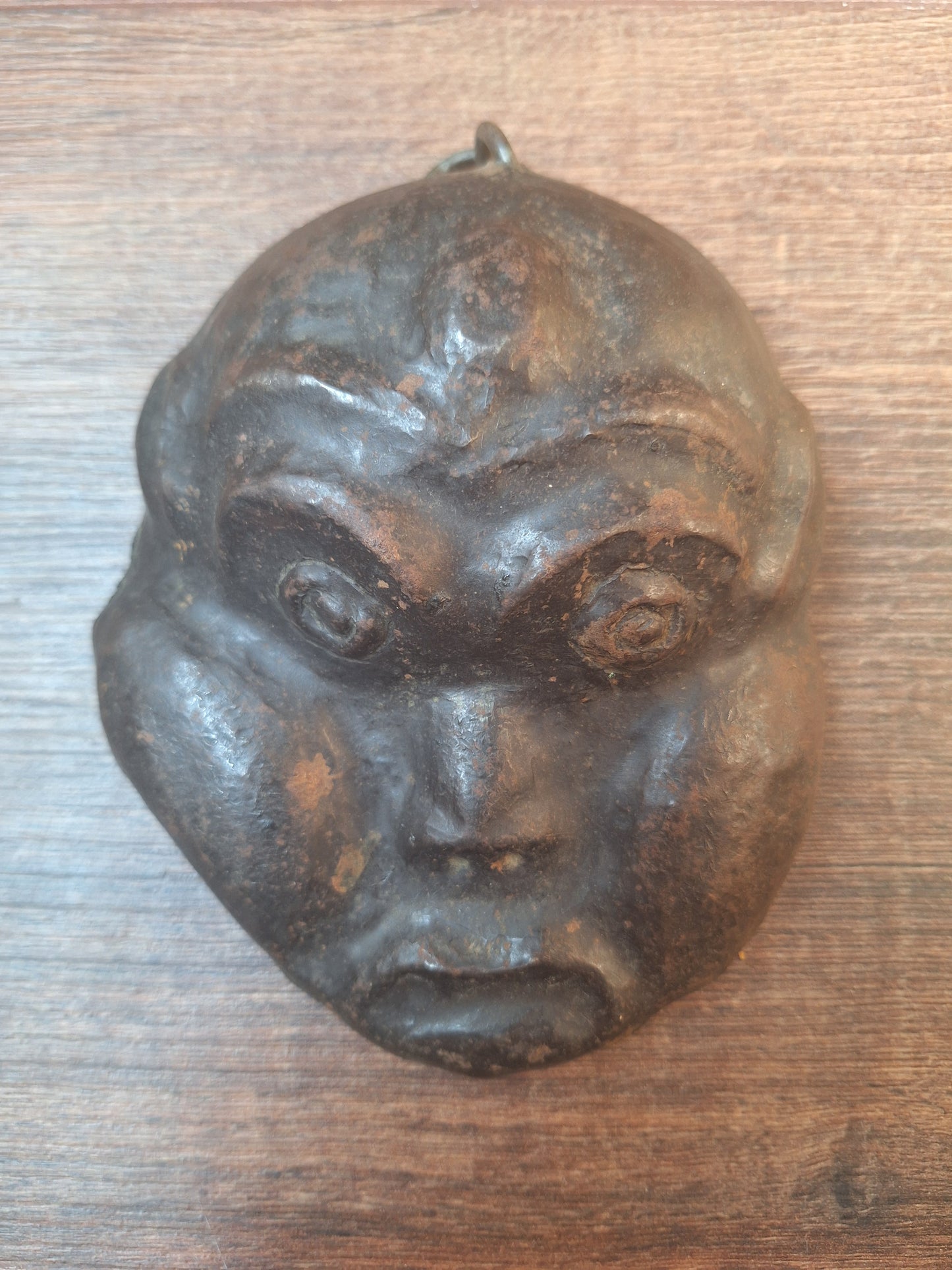 Vintage Nepalese iron spirit mask