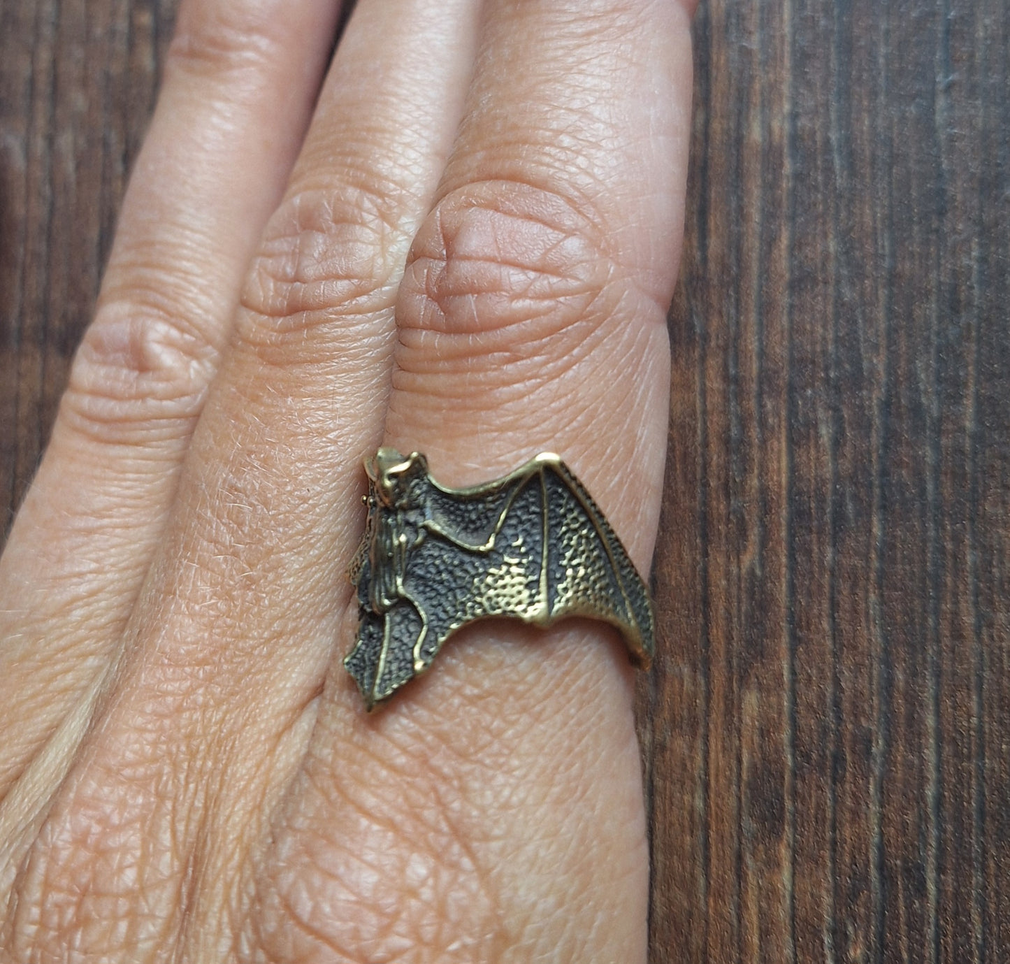 Brass ring Bat