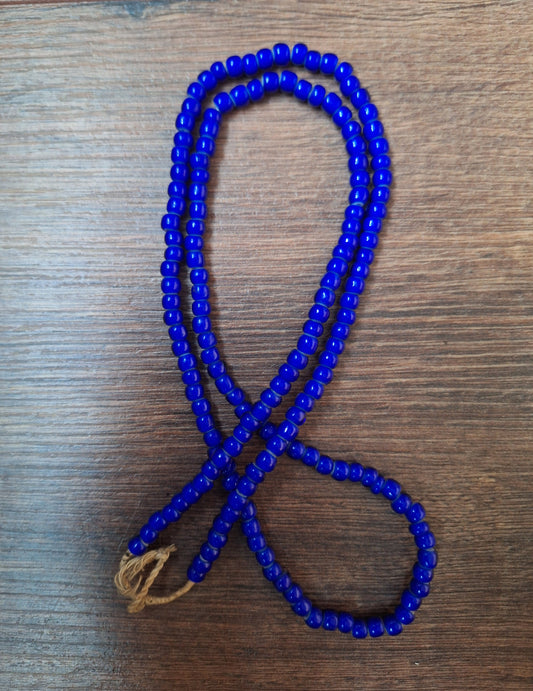 Blue glass bead strand