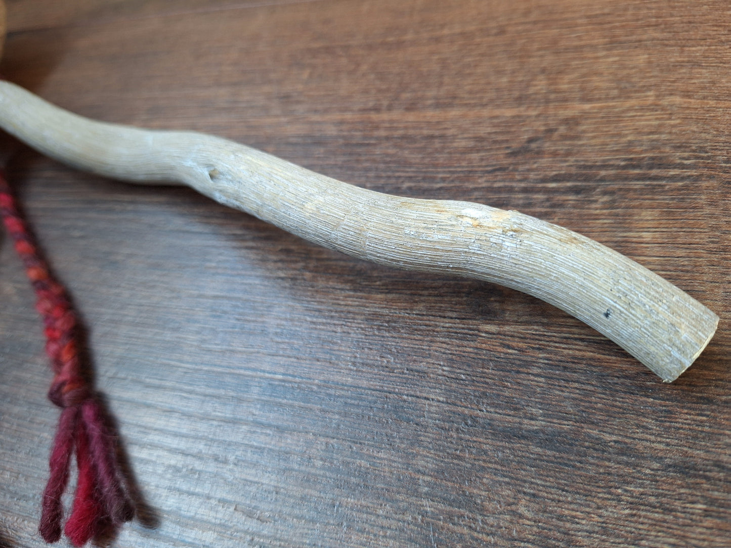 Horse hide and driftwood rattle