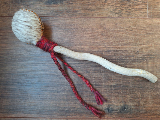 Horse hide and driftwood rattle