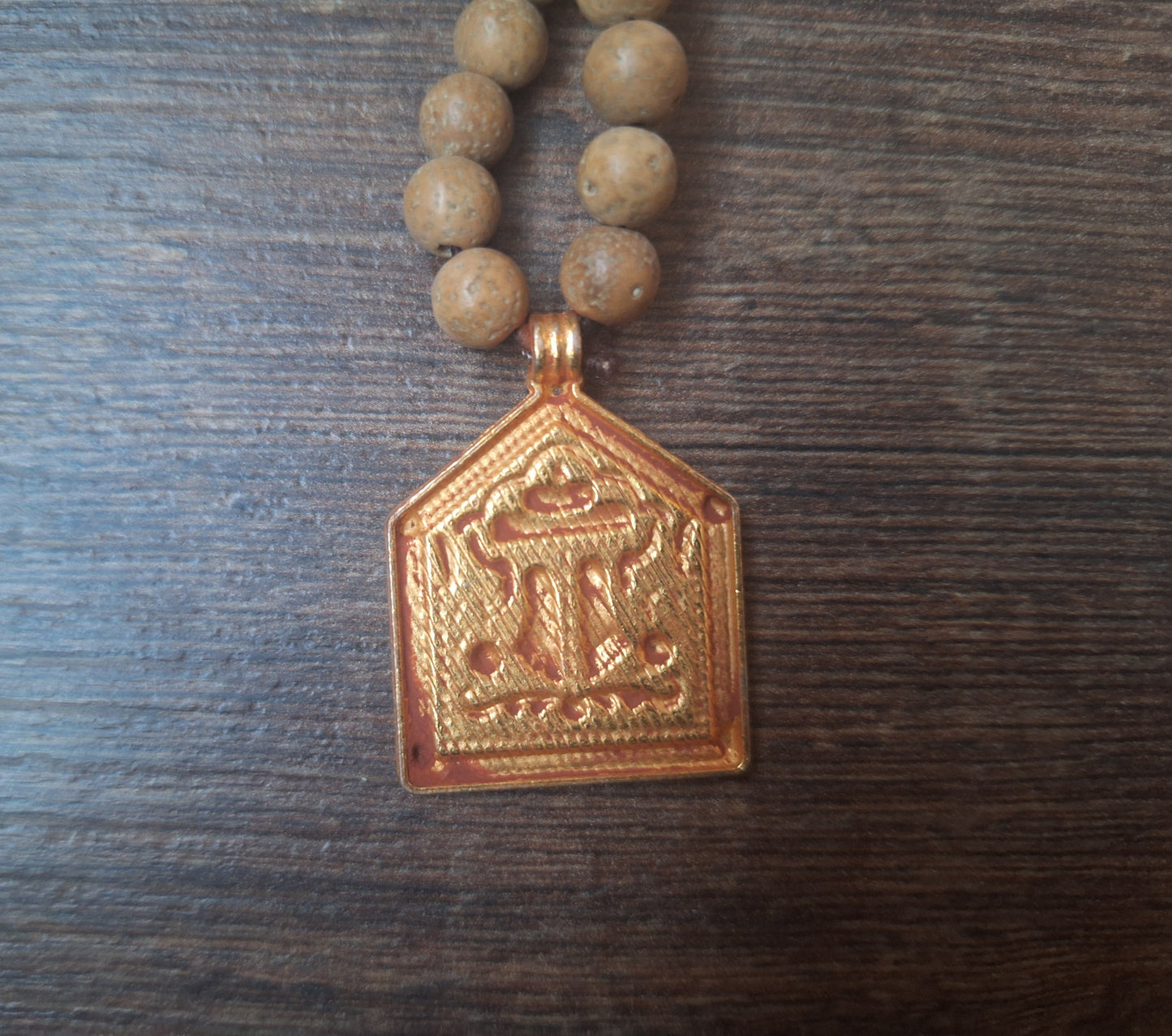 Vintage bodhi seed mala with Feet of the Buddha pendant