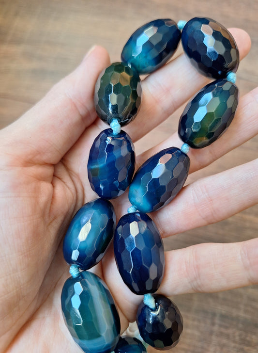 Faceted blue agate bead strand