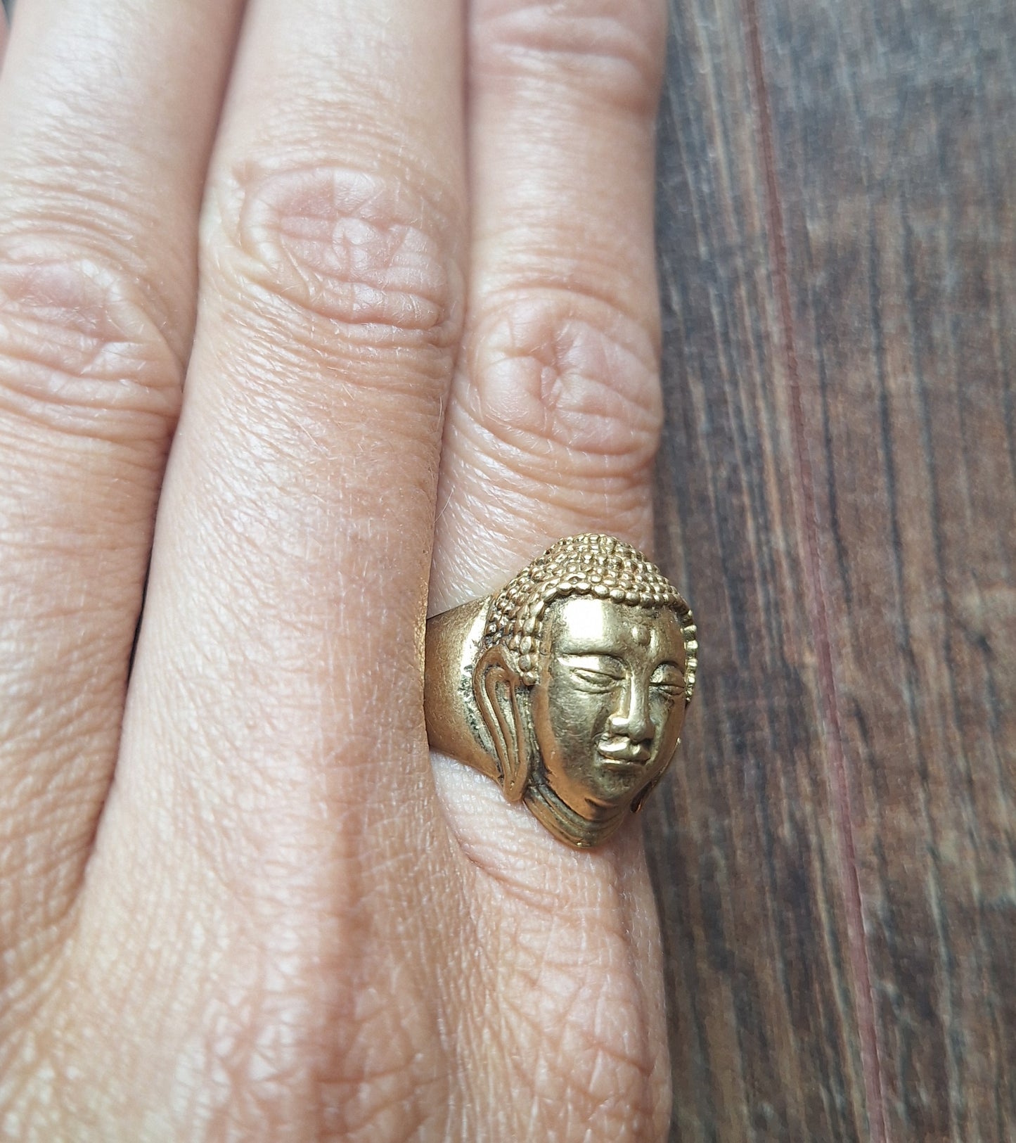 Brass ring Buddha