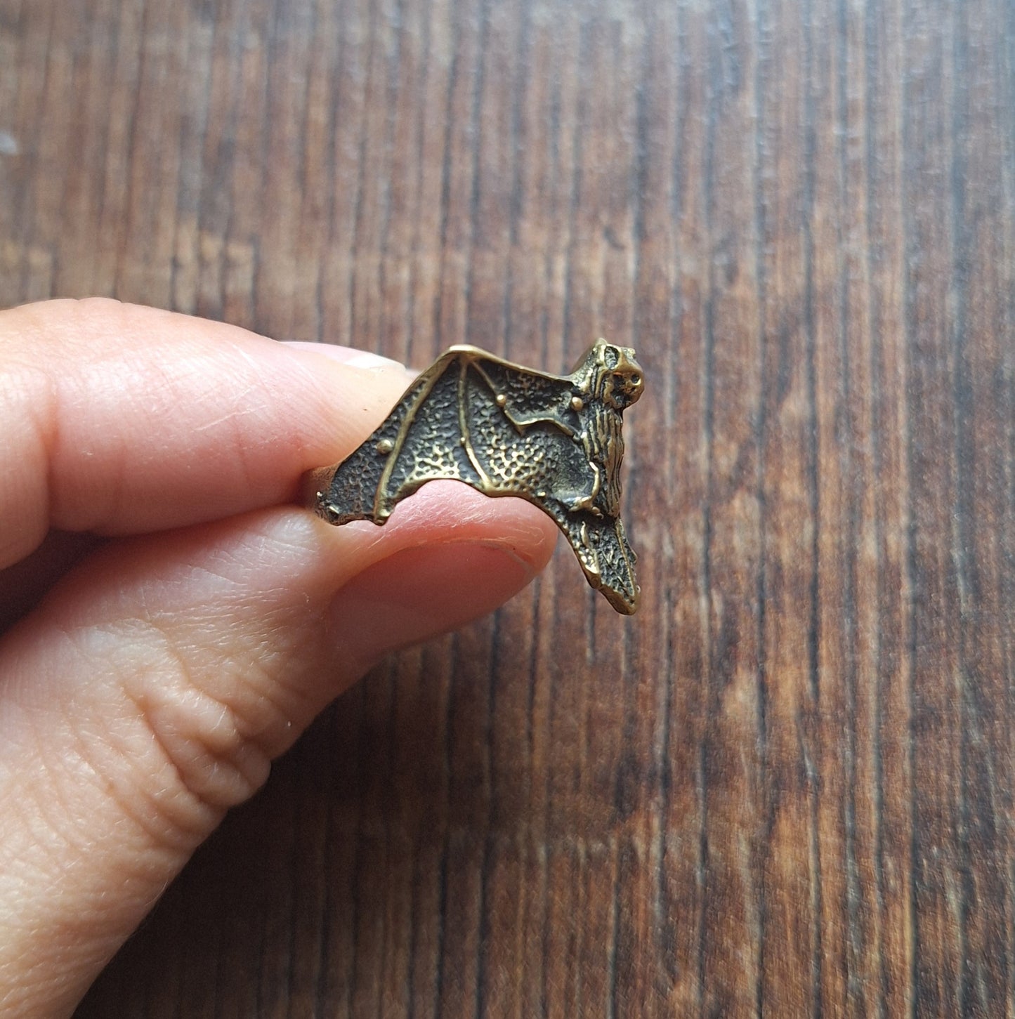 Brass ring Bat