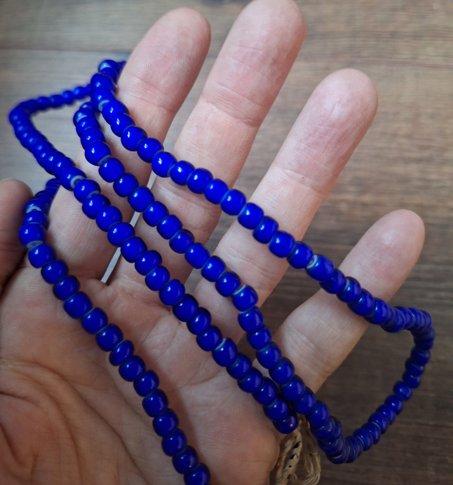 Blue glass bead strand