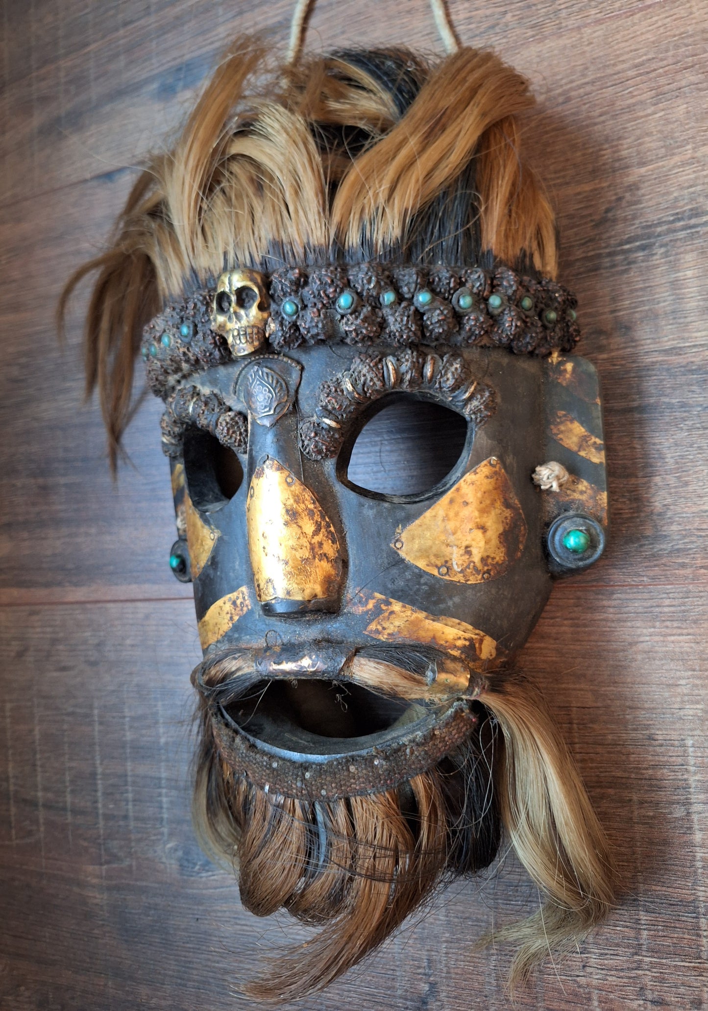 Vintage wooden wrathful spirit mask with metal plating, beads and yak hair