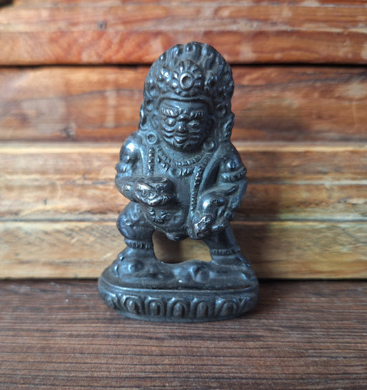 Vintage cast iron Black Dzambala figurine