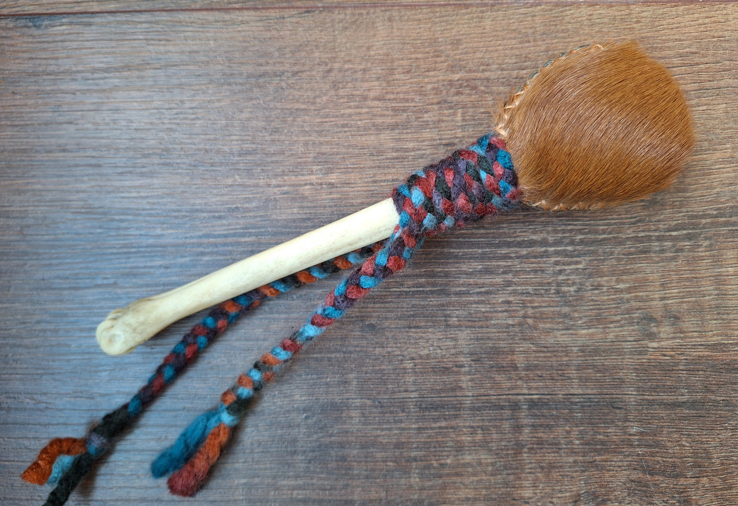 Horse hide and roe deer leg bone rattle