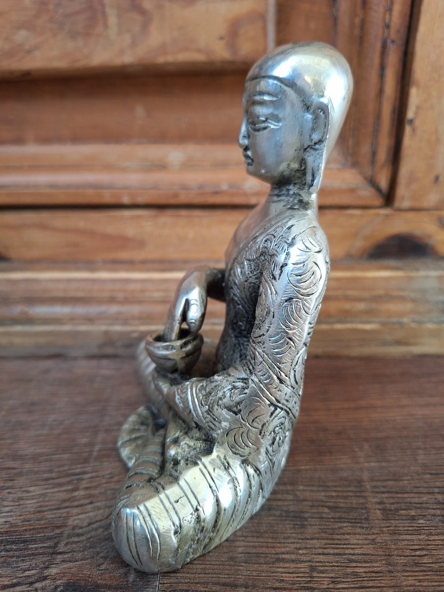Vintage white metal Shakyamuni Buddha statue
